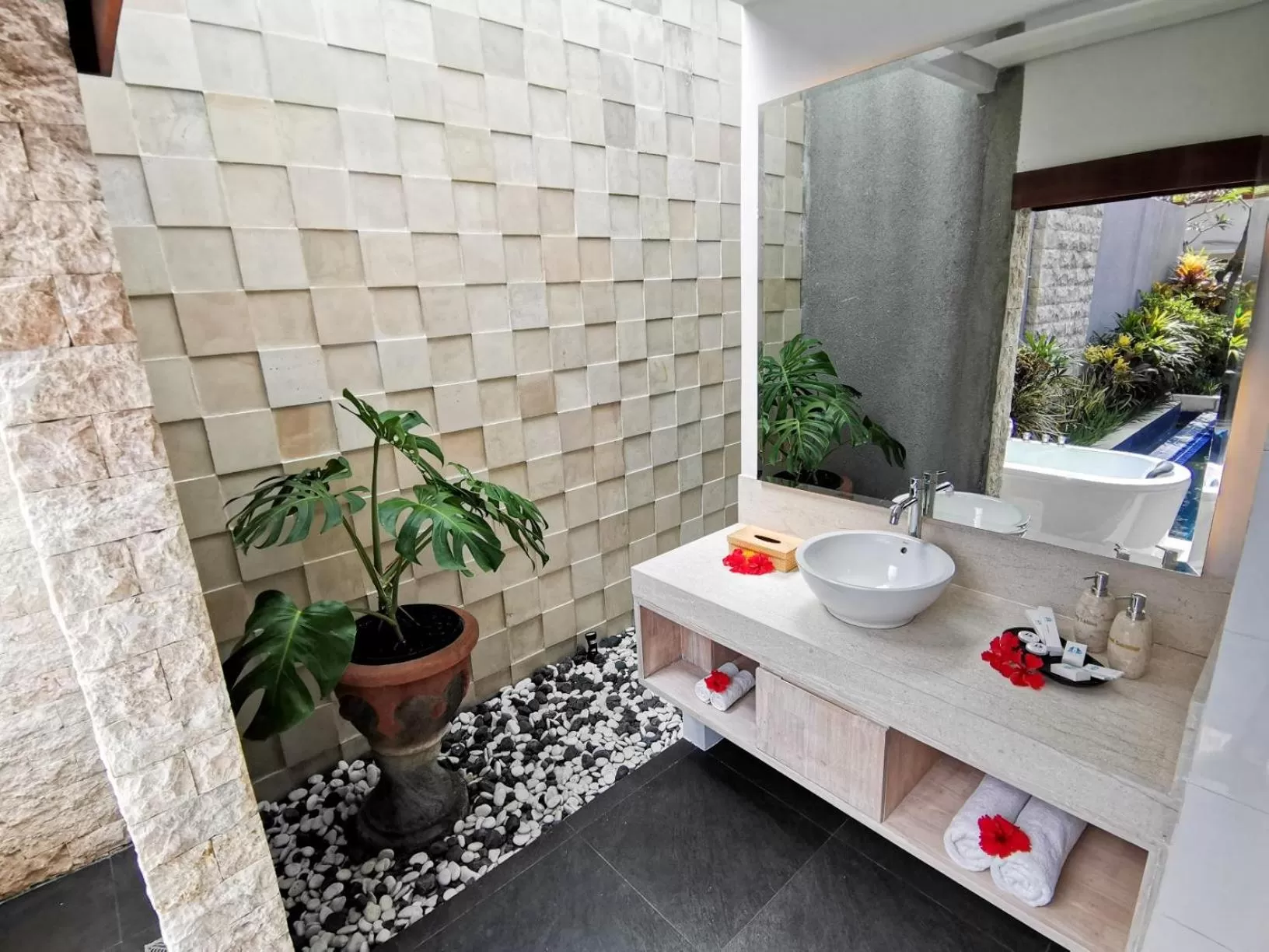 Bathroom in Kuta Puri Bungalows, Villas and Resort