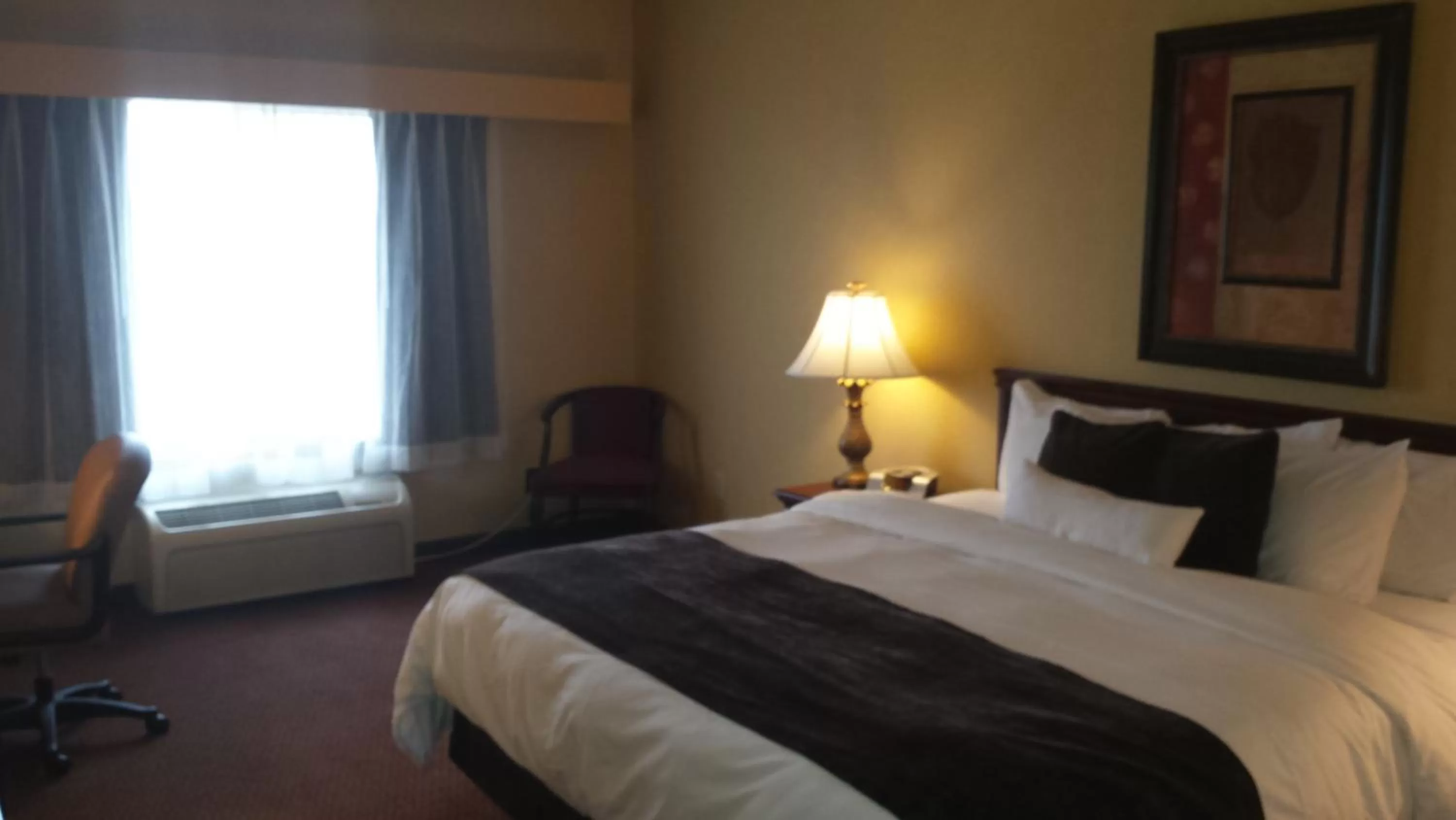 Bed in Town & Country Inn and Suites