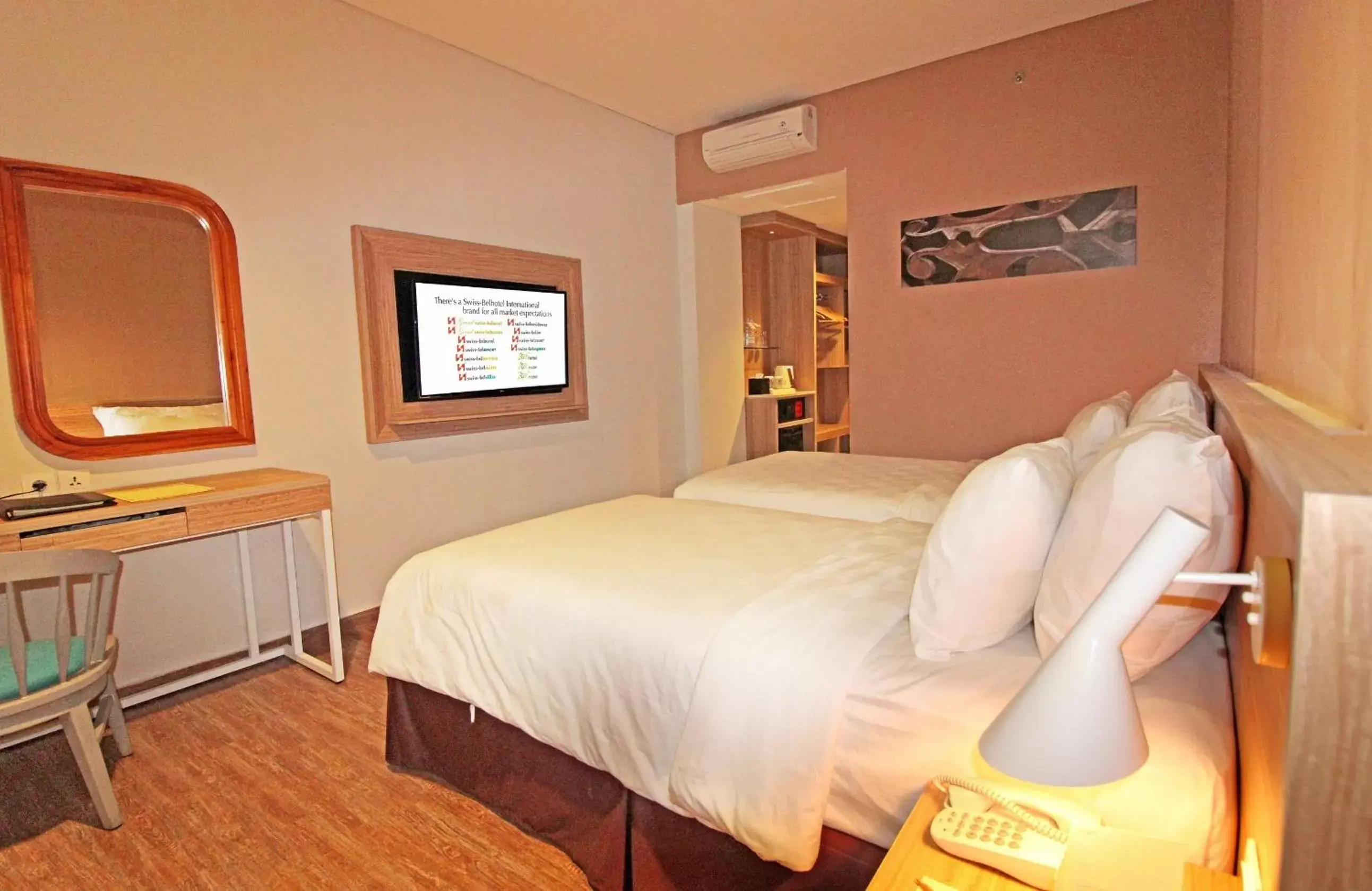 Bed in Swiss-Belhotel Manokwari