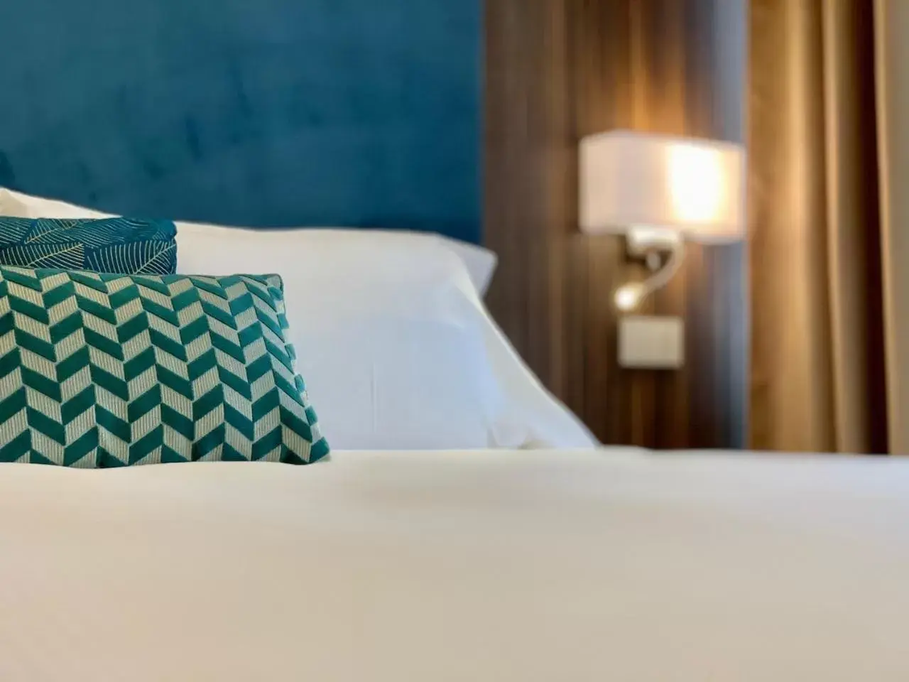 Bed in Hotel Brescia