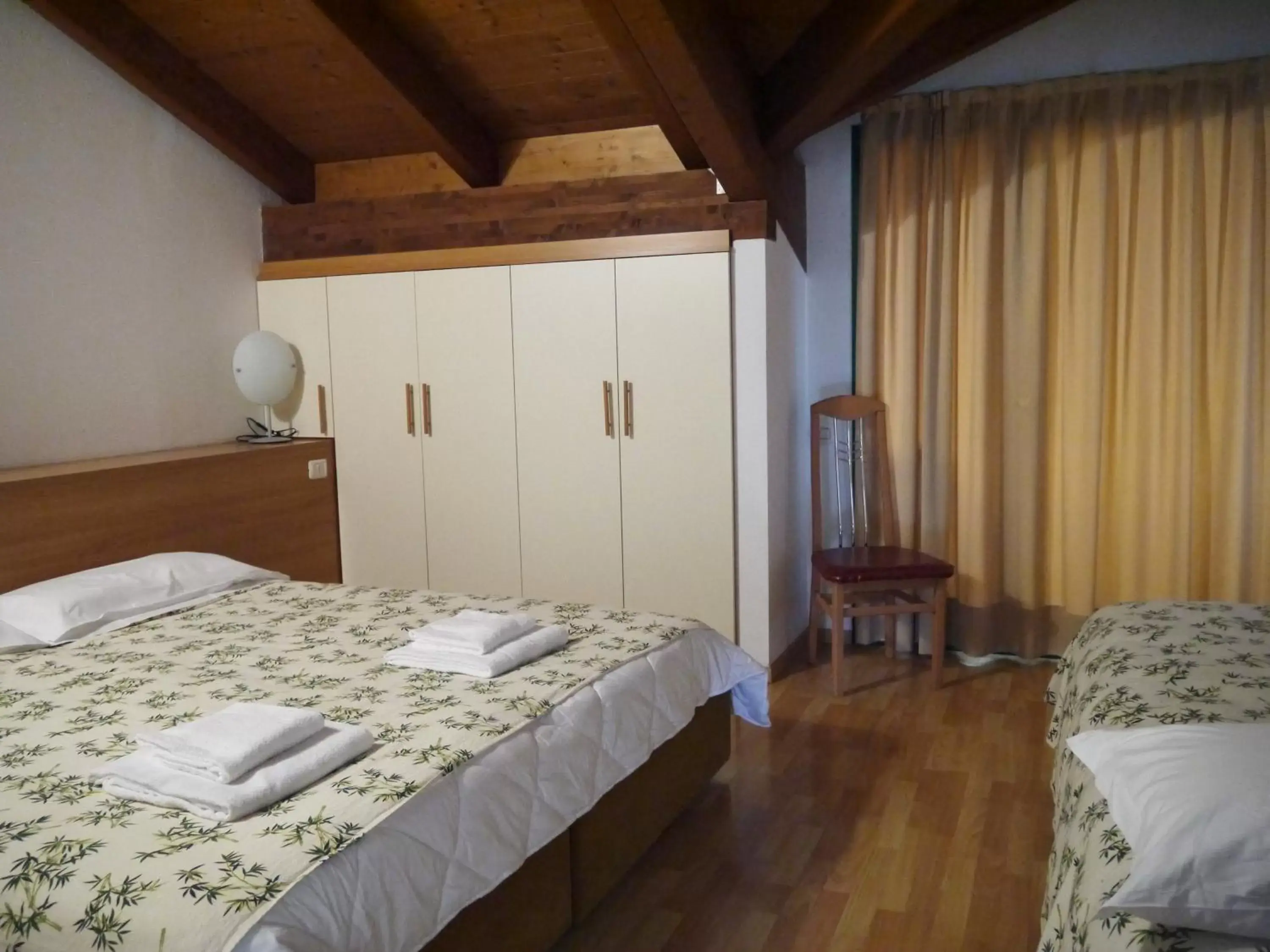 Bed in Hotel Oasi