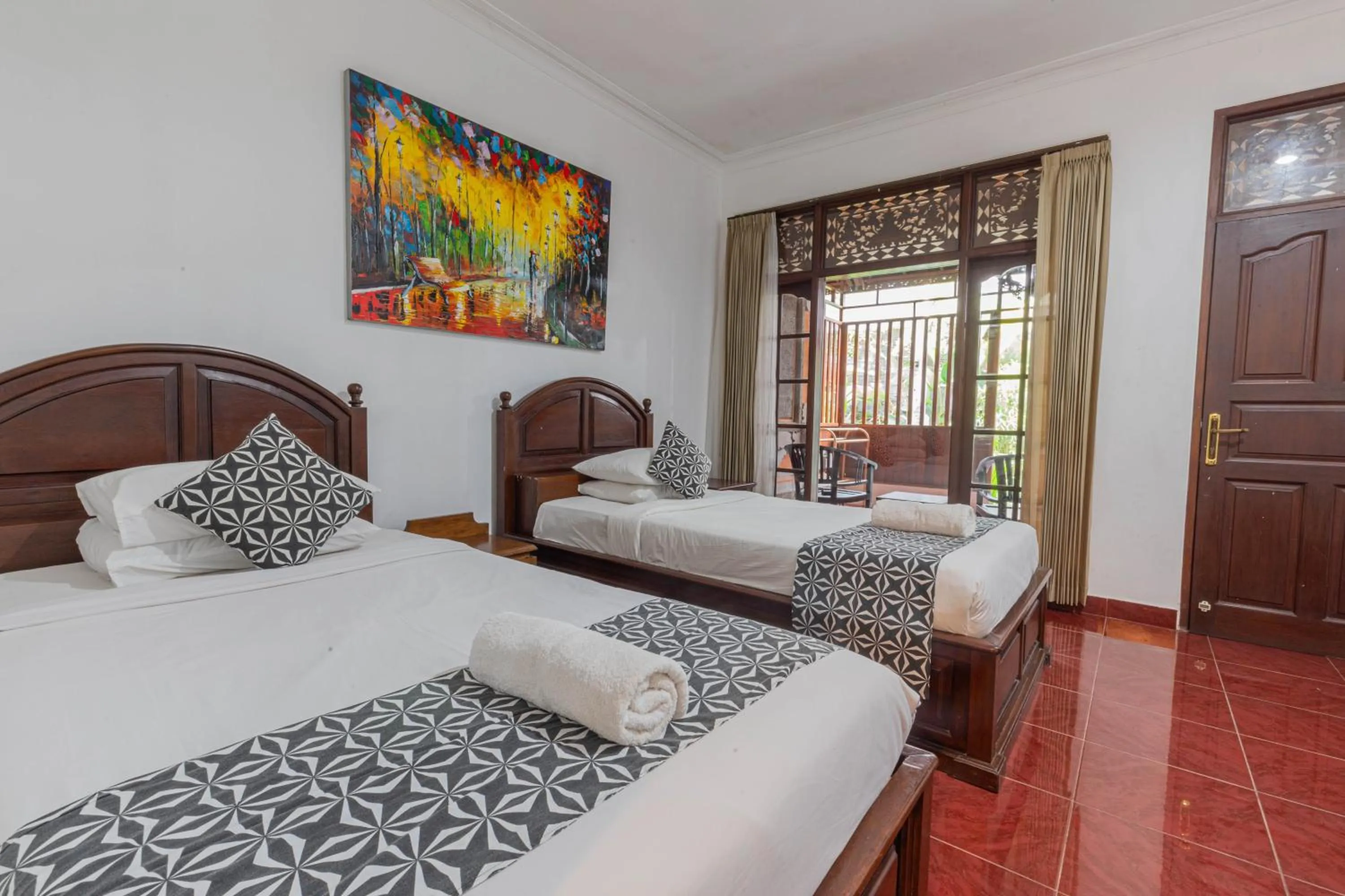 Bedroom in Puri Mango Guest House Sanur