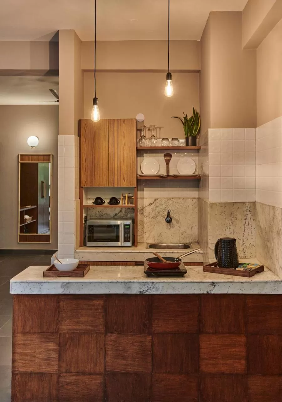 Kitchen or kitchenette in Minimalist Poshtel & Suites