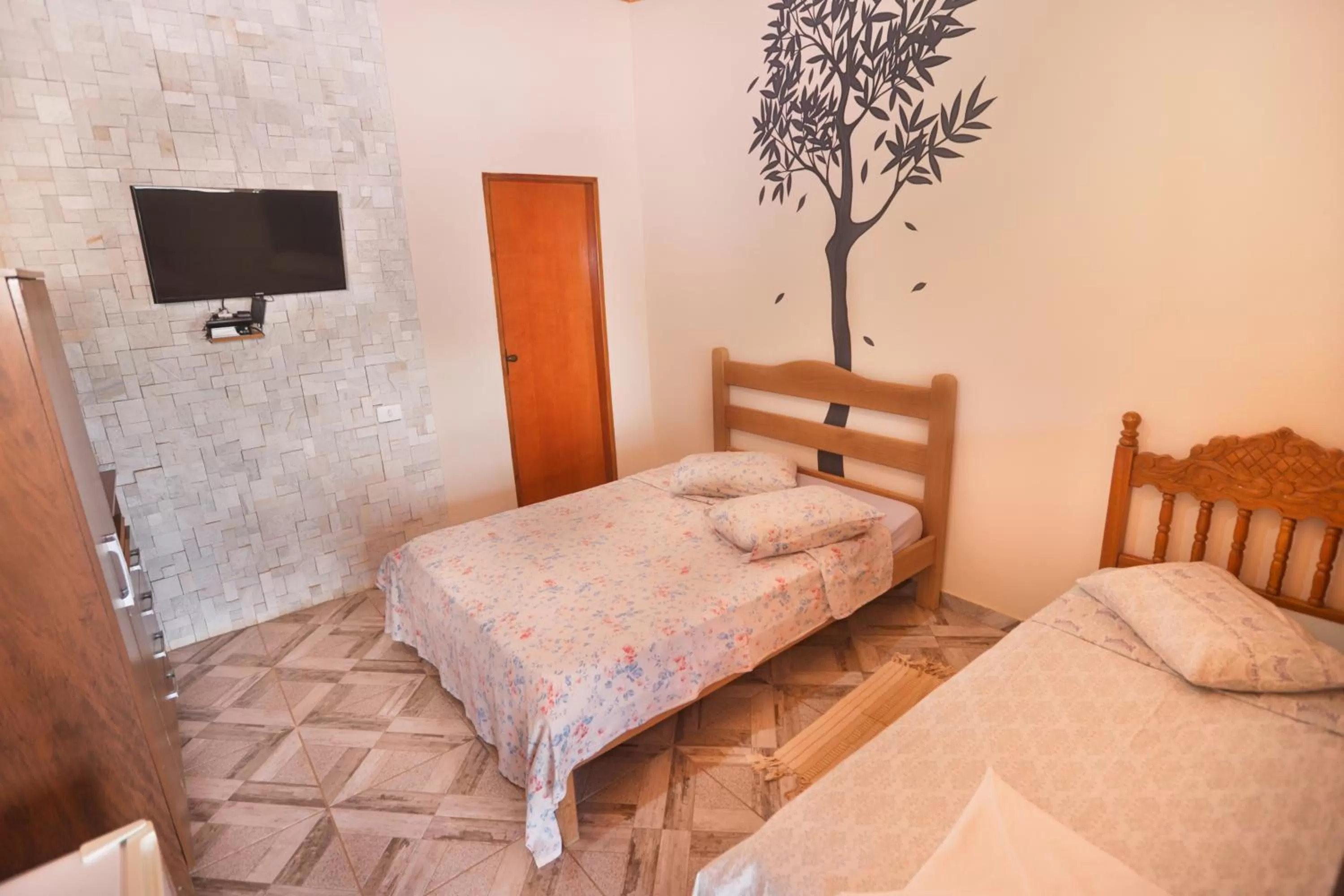 Bed in Pousada e Chales Por do Sol