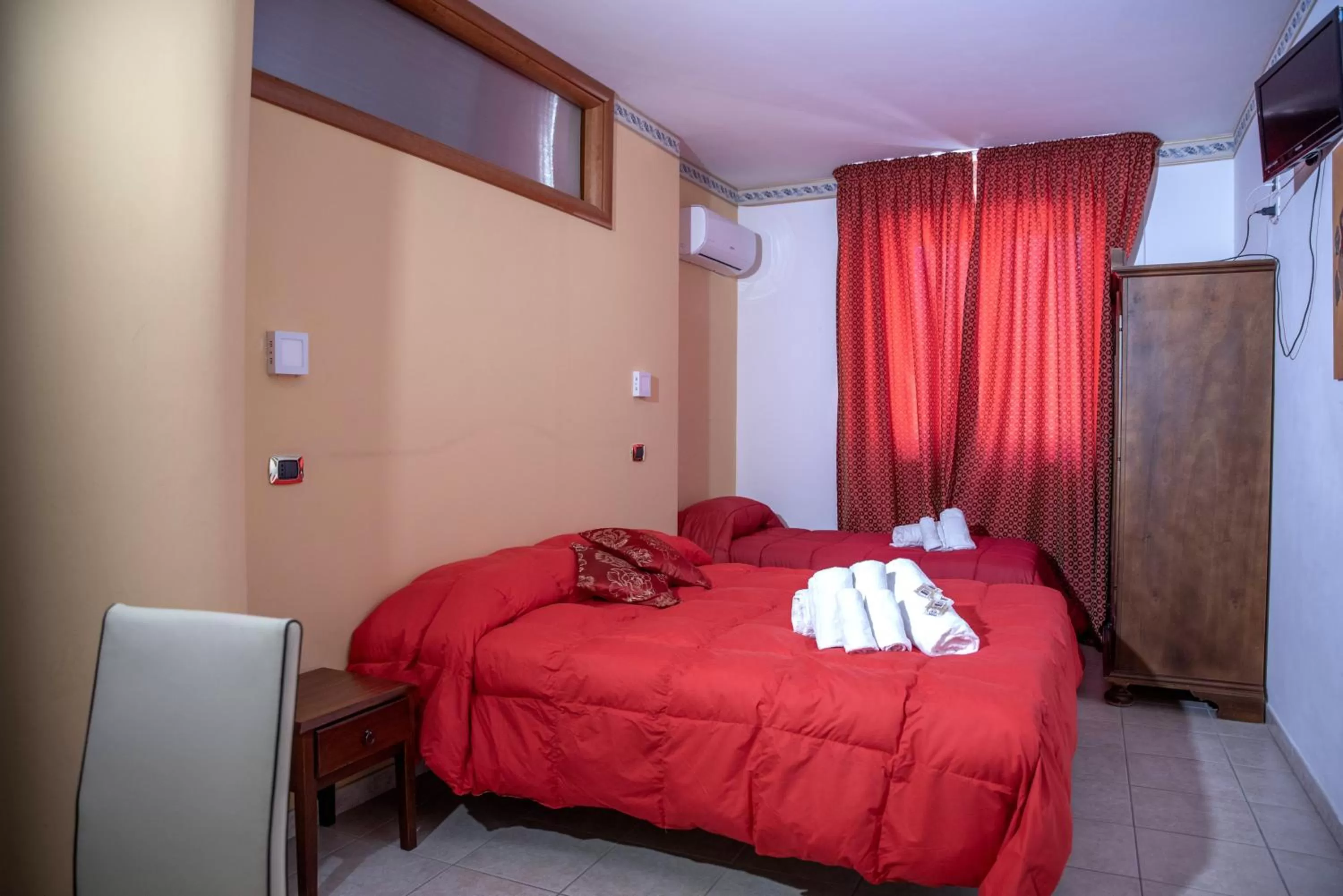 Bed in Carlo V - Holiday Rooms