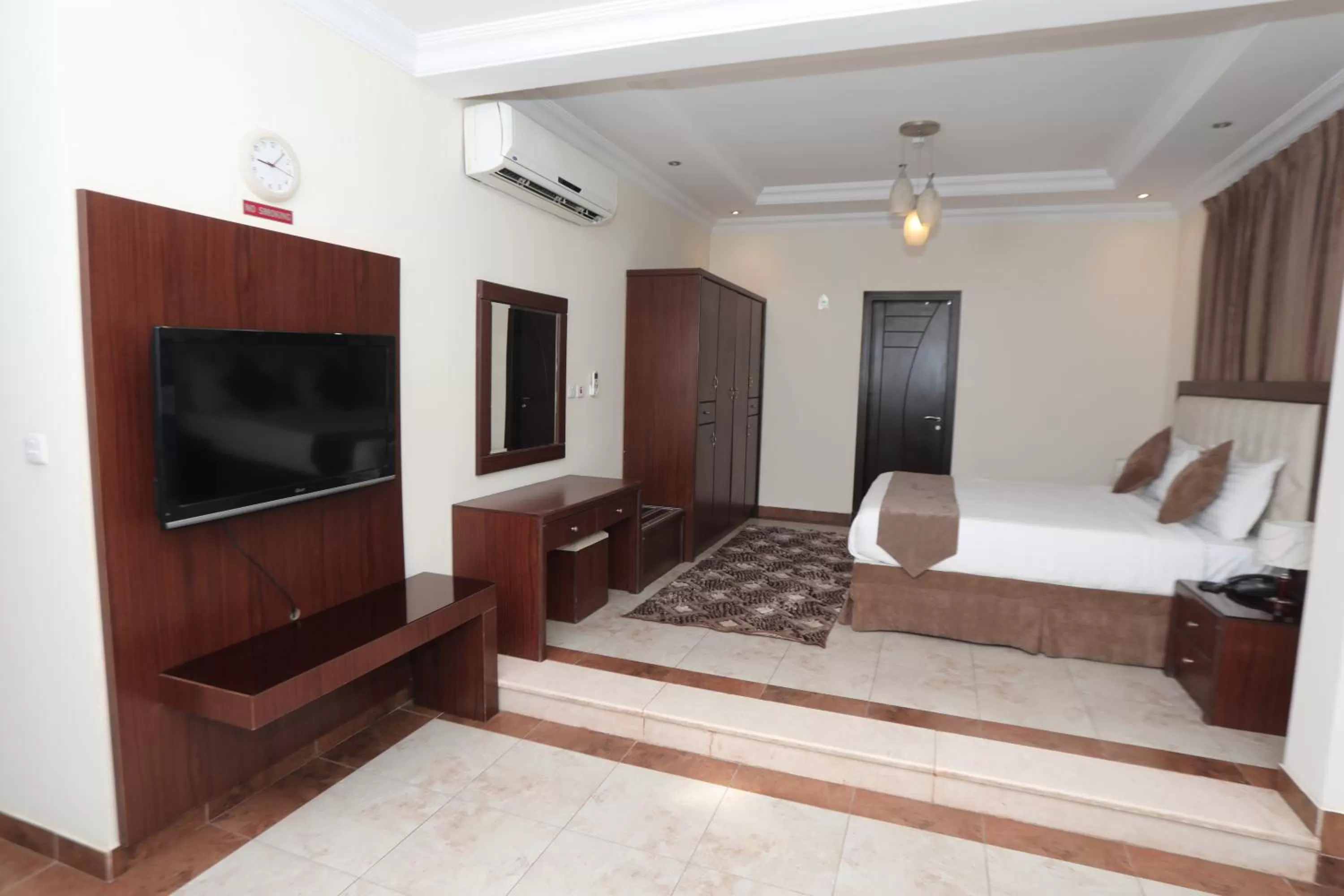 Living room, TV/Entertainment Center in Samaya Suites