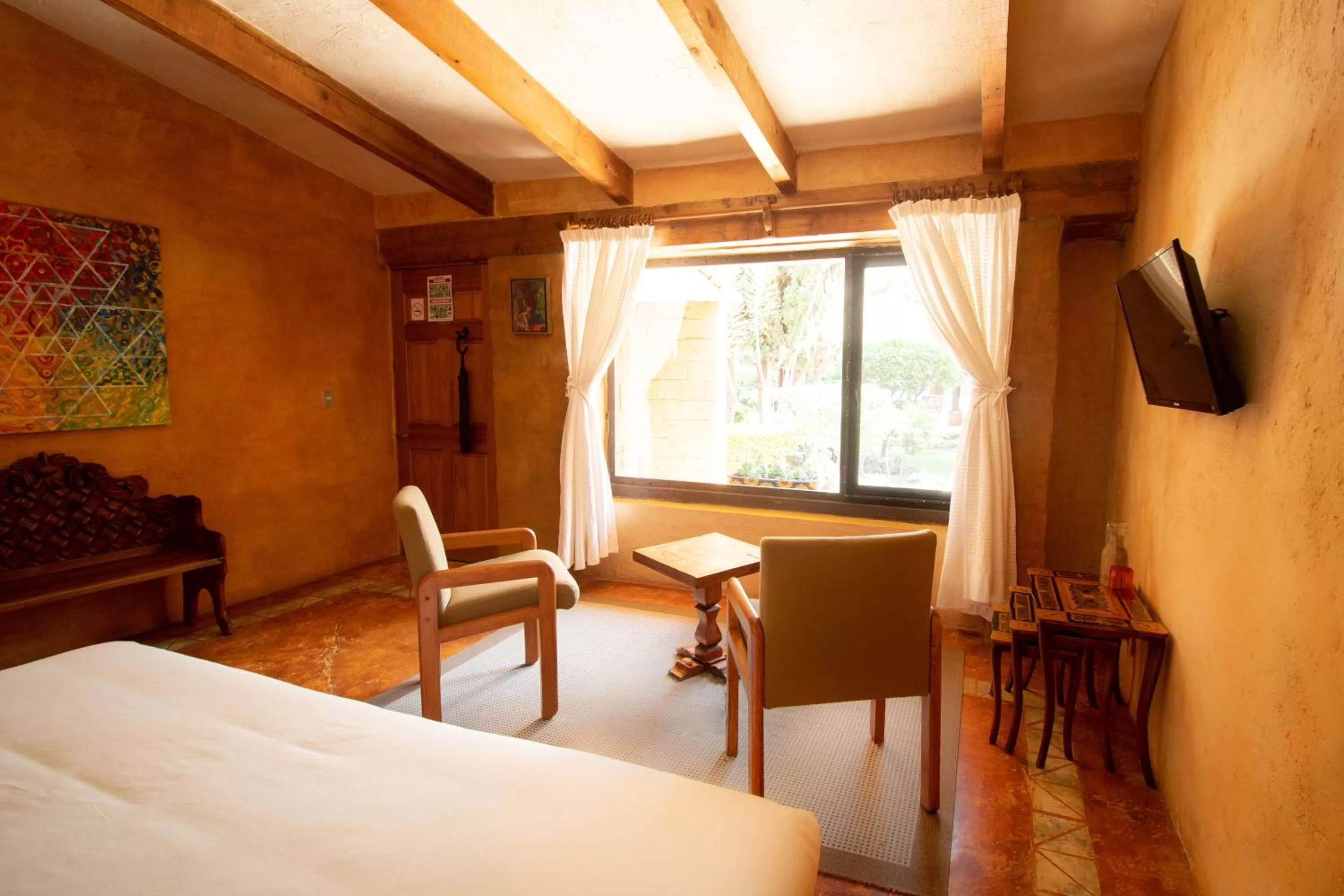 Seating area, Bed in Quinta Ascensión Hotel Boutique Only Adults