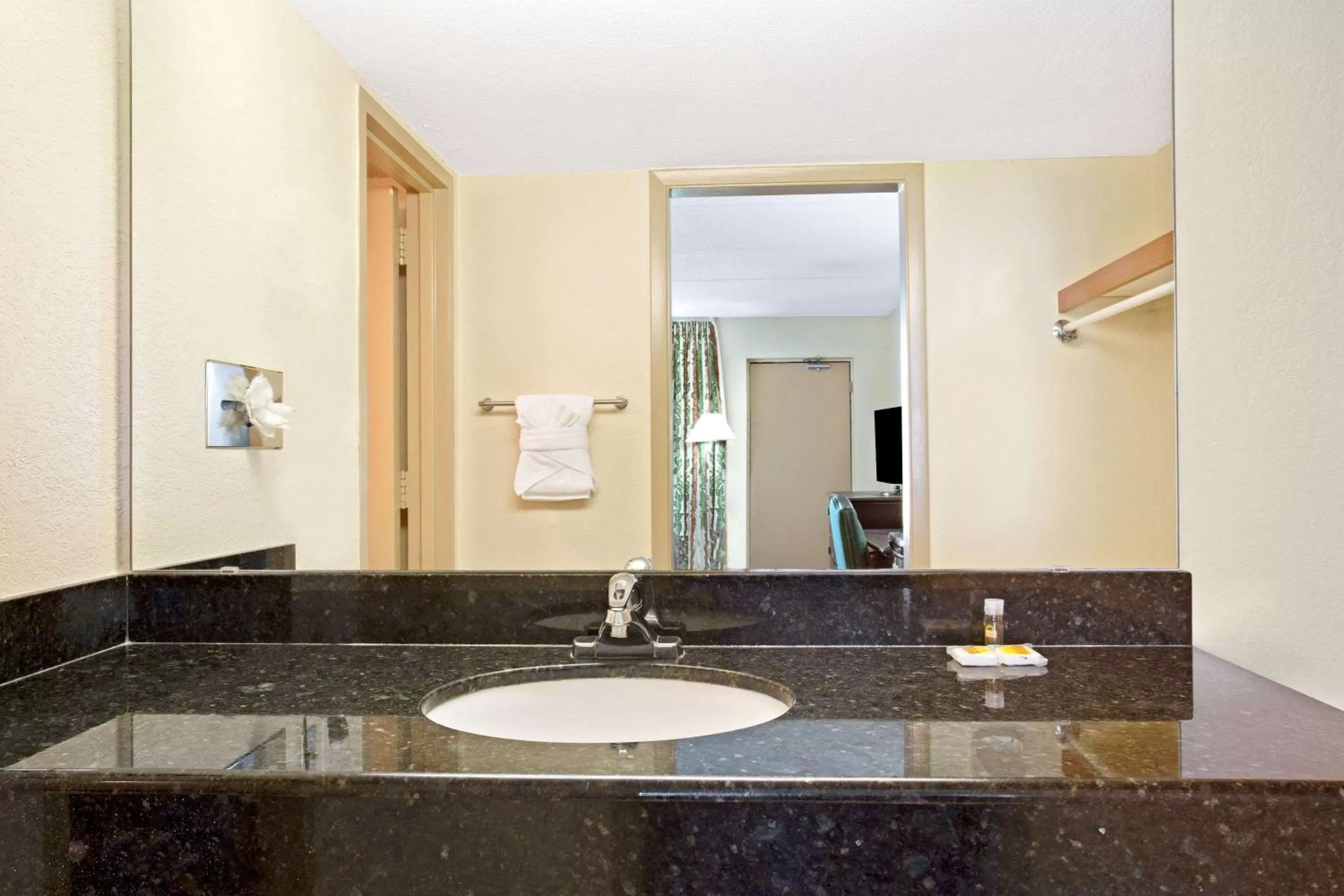 Bathroom in Days Inn by Wyndham Orlando Airport Florida Mall
