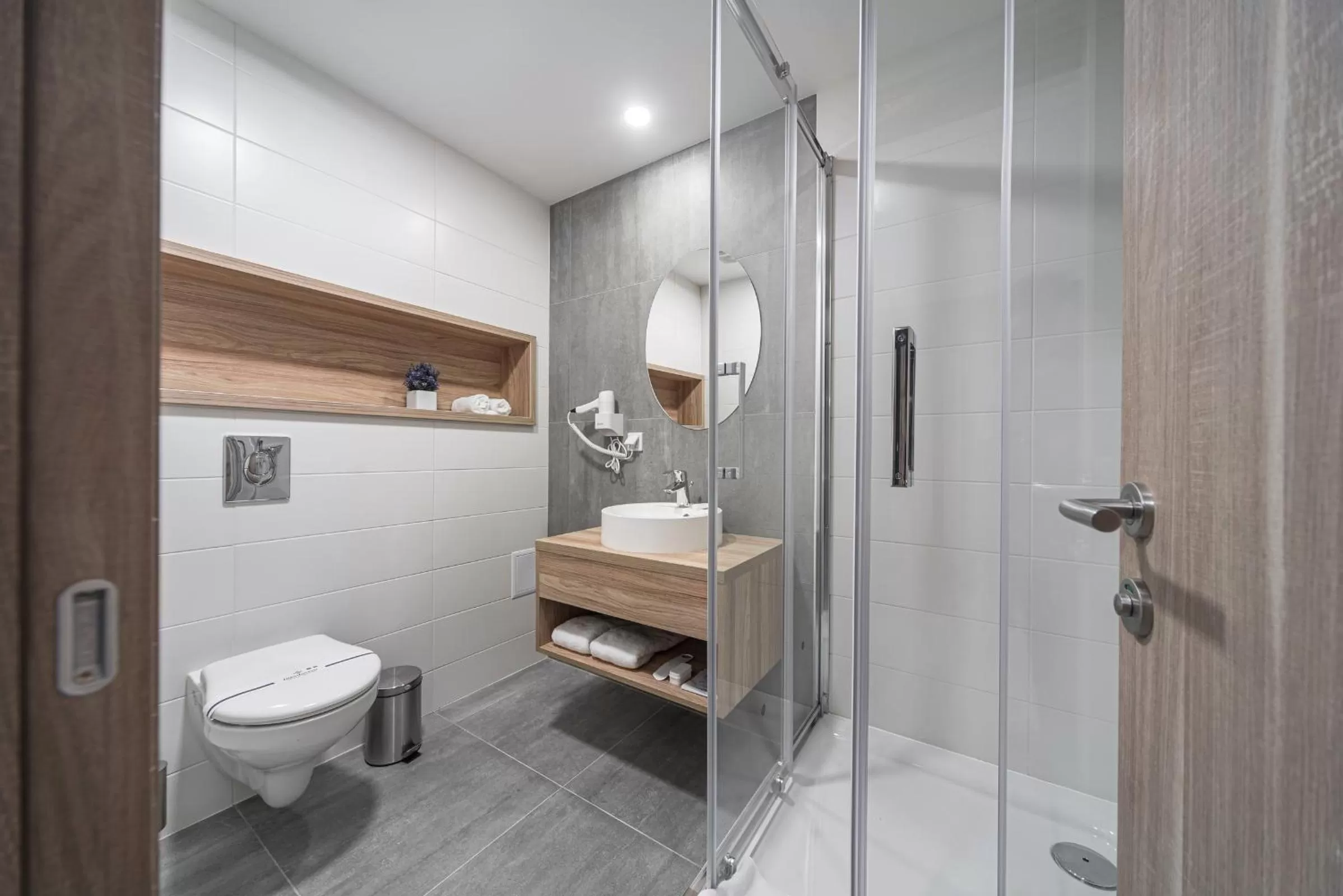 Toilet in Amarant Urban Hotel by CHM