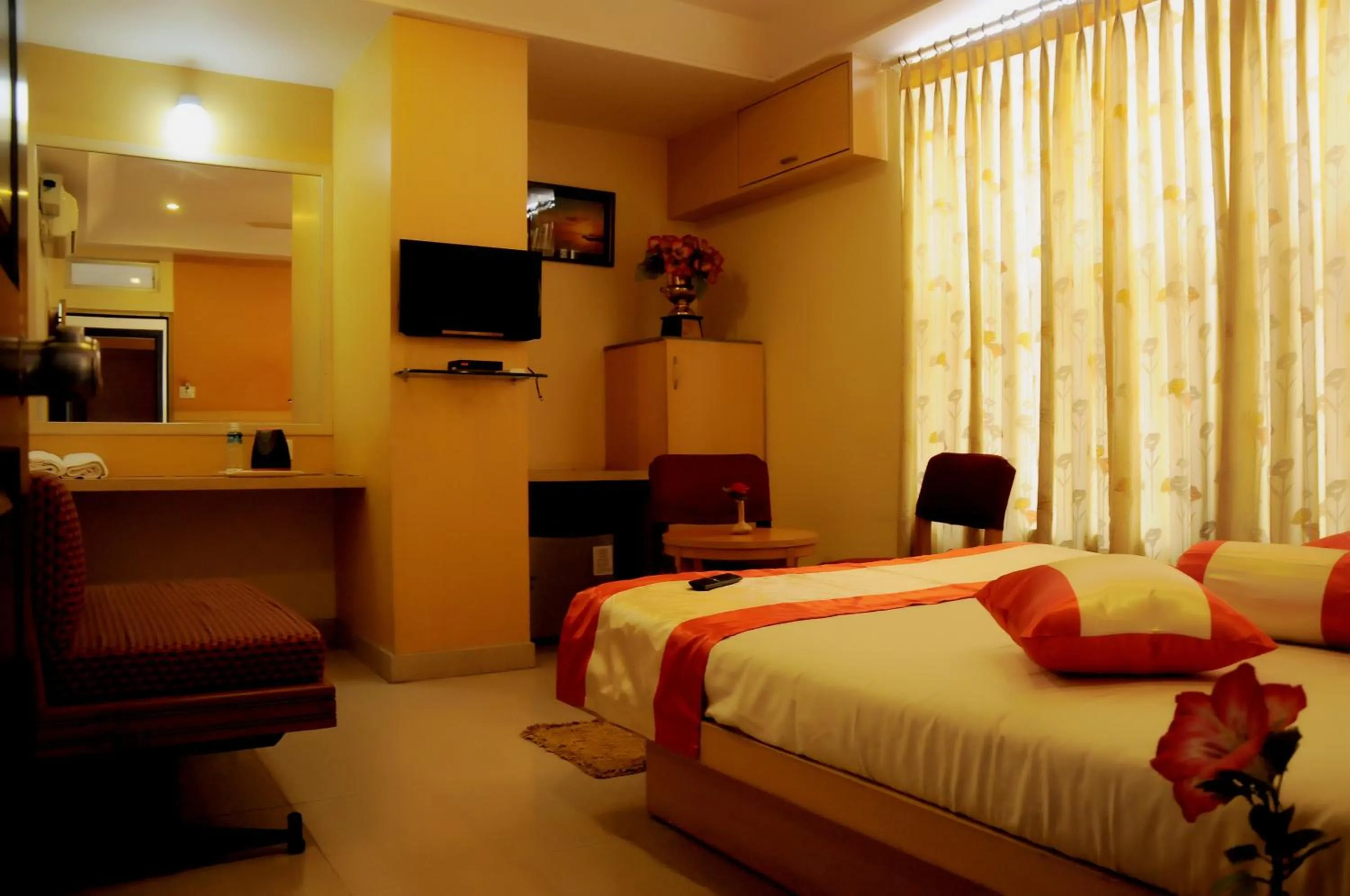 Photo of the whole room, Bed in Suvarna Residency