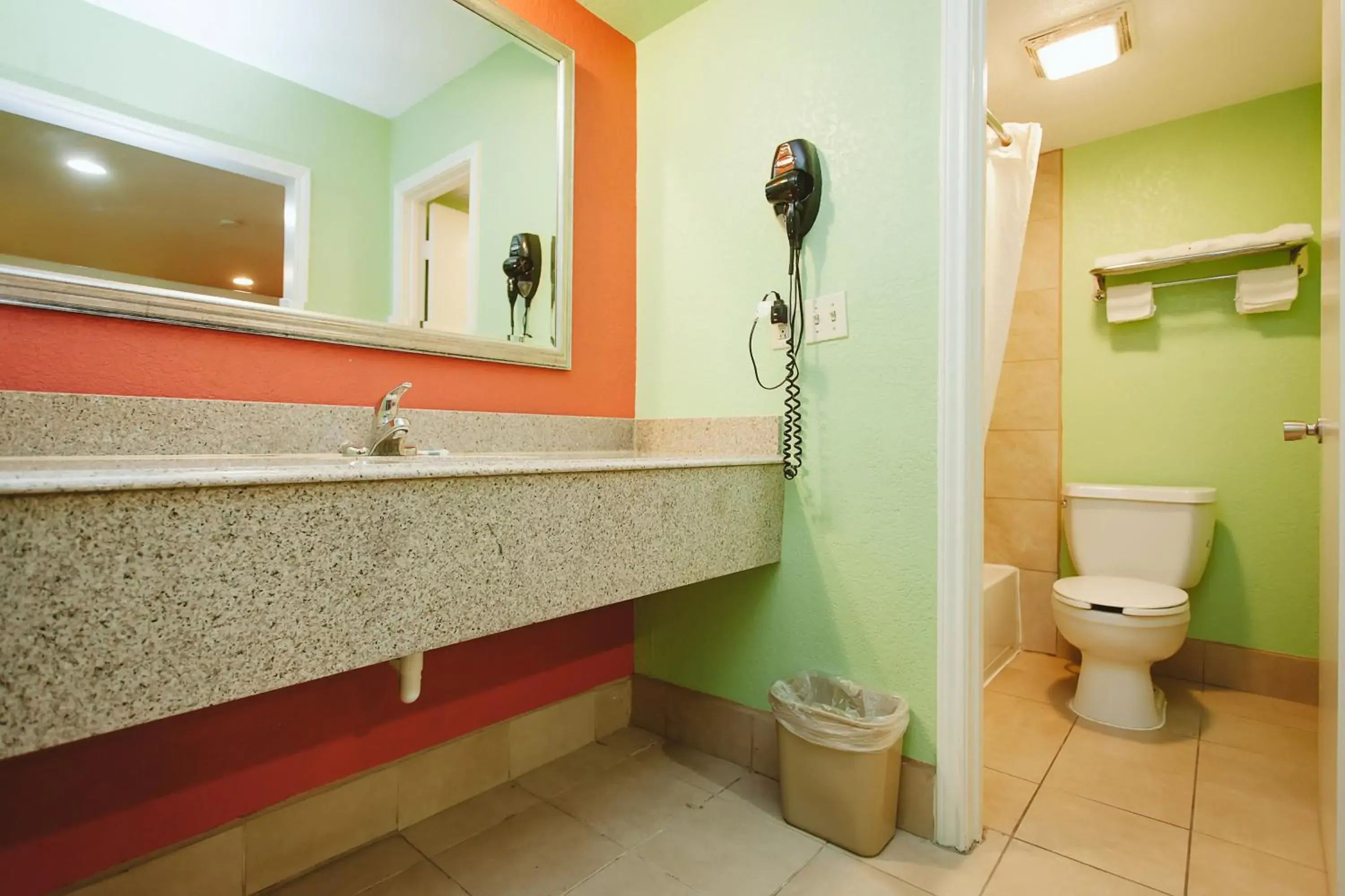 Property building, Bathroom in REGENCY INN - CHANNELVIEW