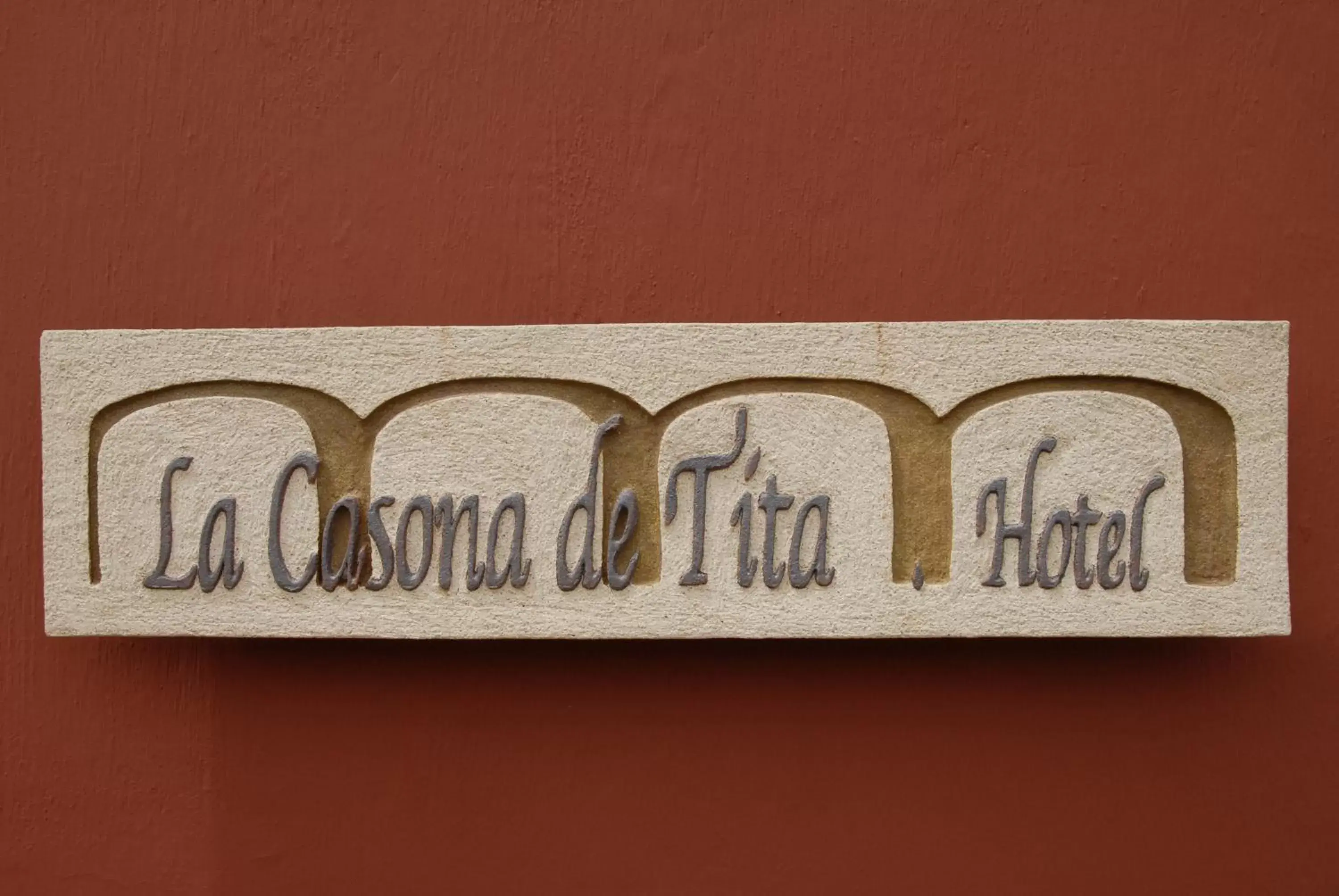 Property logo or sign in Hotel La Casona de Tita