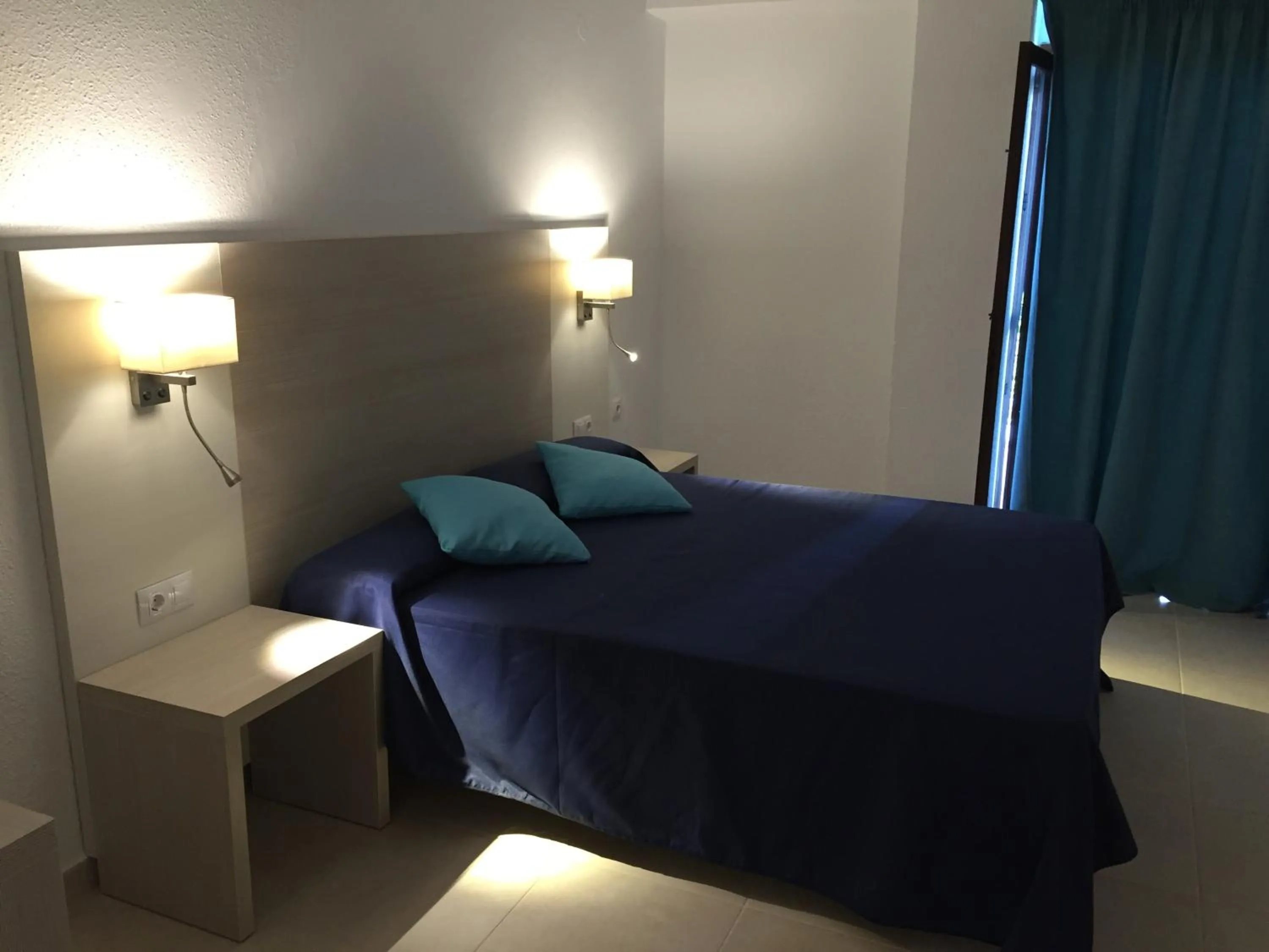 Bed in Hotel Antares