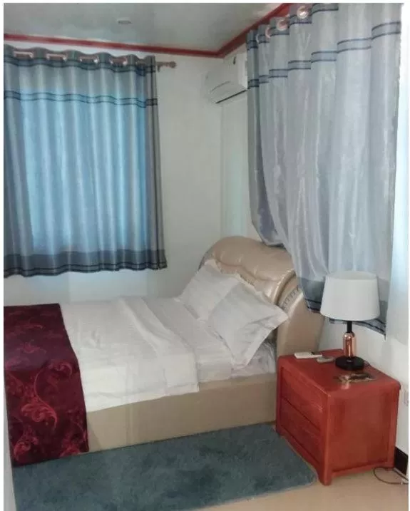 Bed in Riverside Hotel