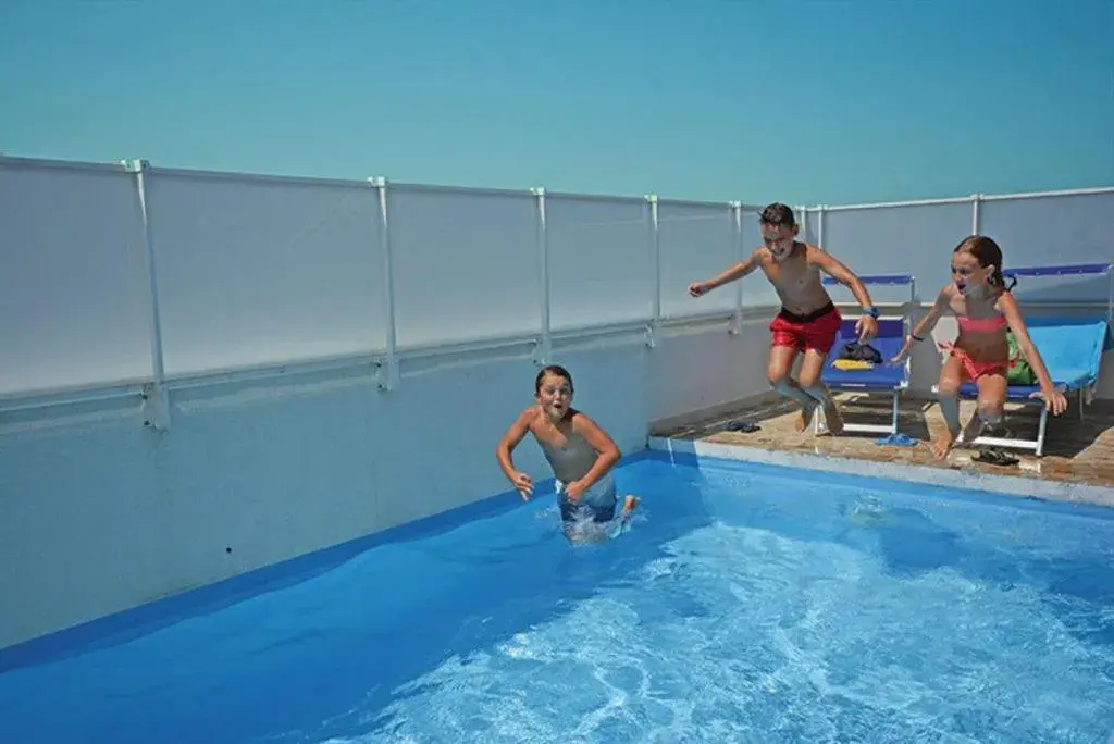 People, Swimming Pool in Hotel Figaro & Apartments