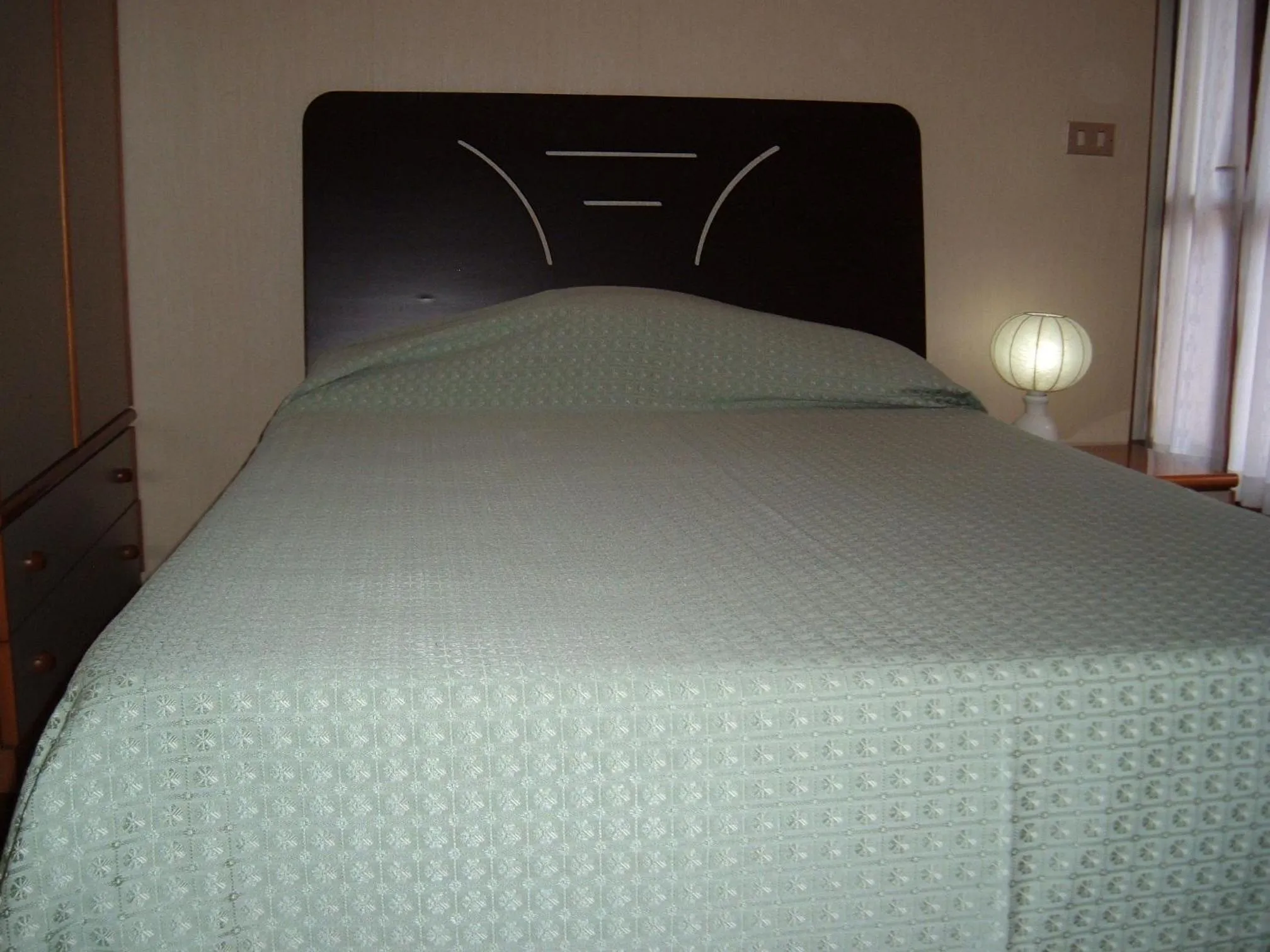 Bed in Albergo Luca