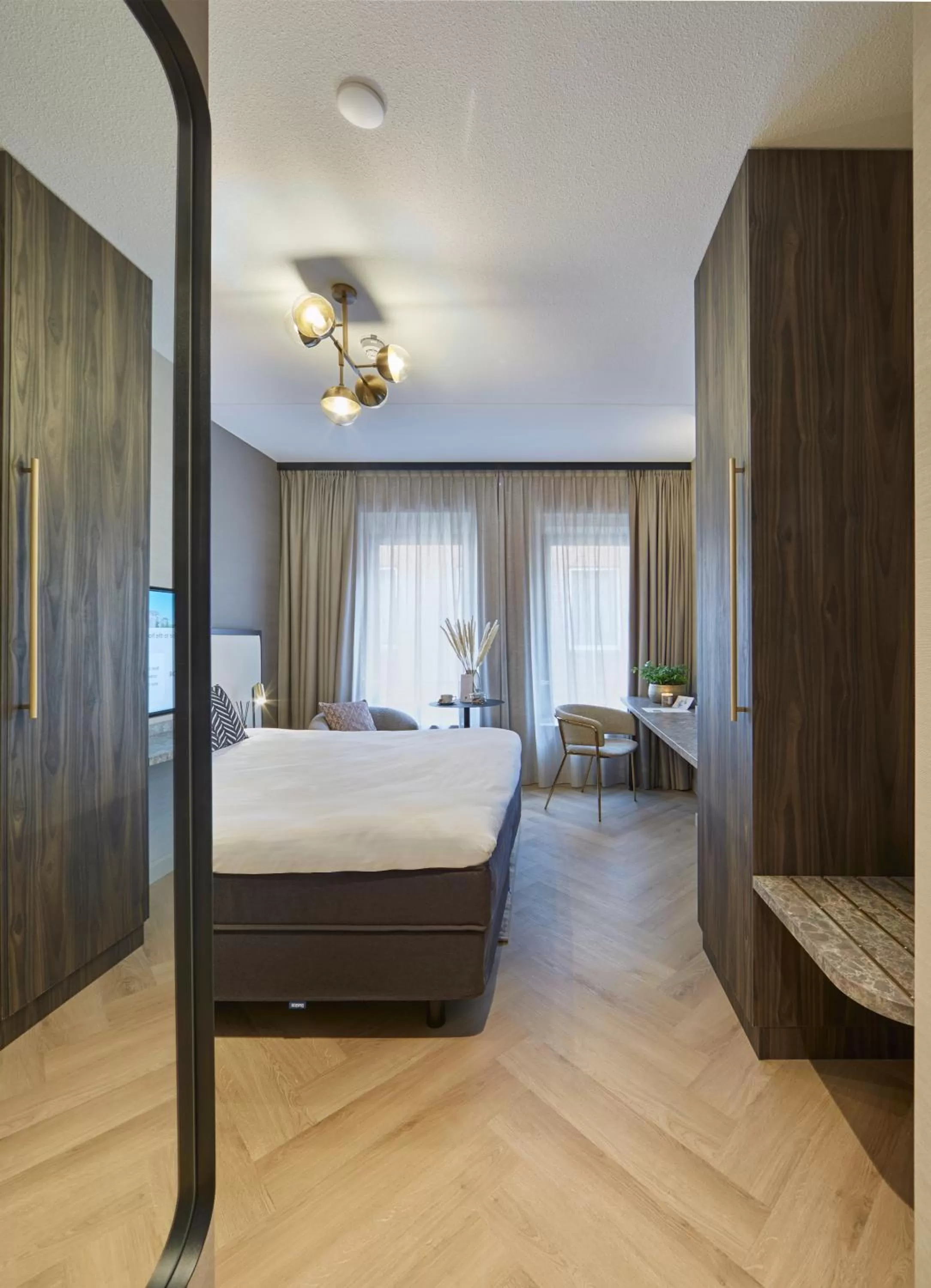 Bed in Breathe Boutique Hotel