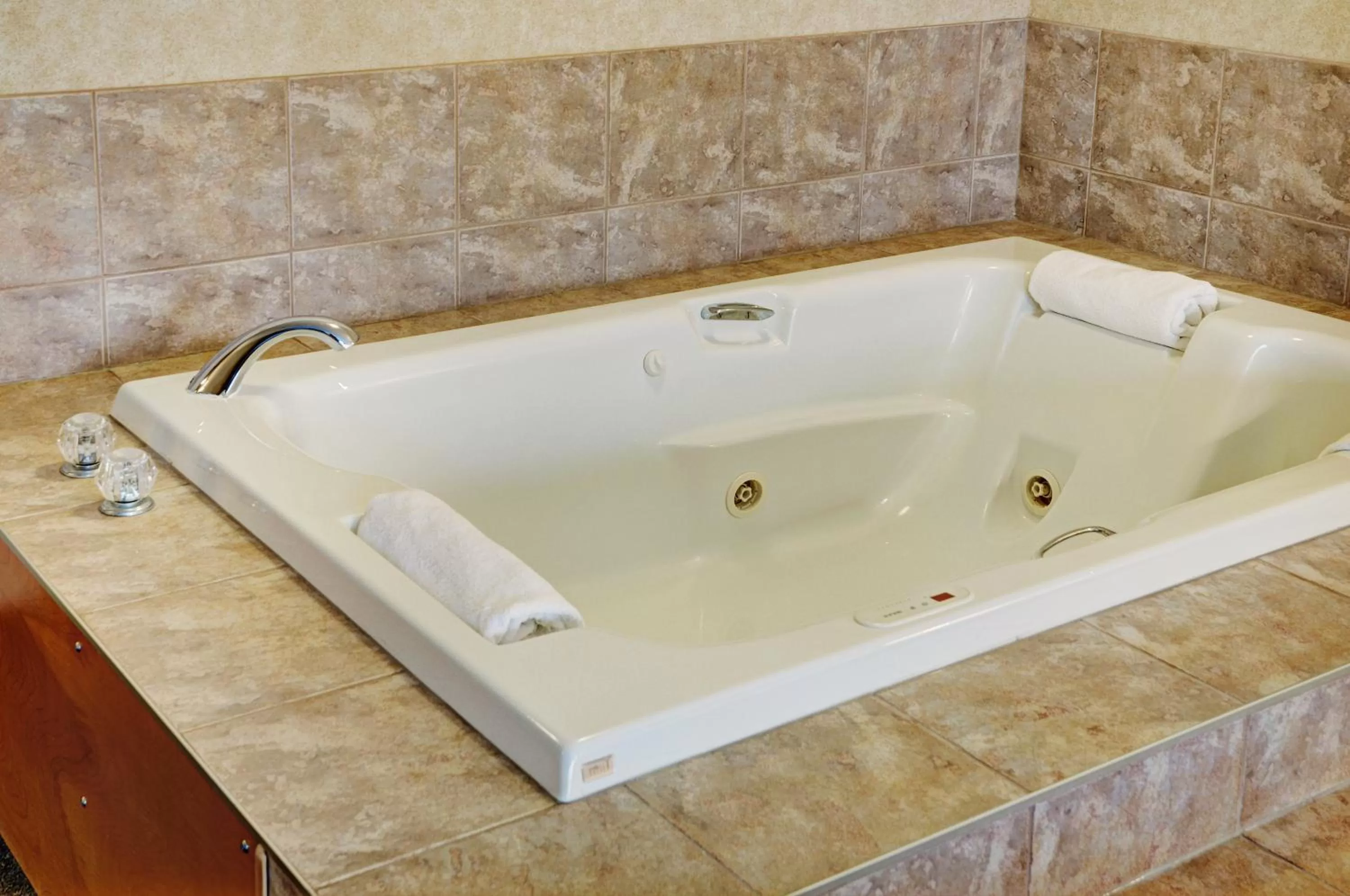 Bathroom in Days Inn & Suites by Wyndham Brooks