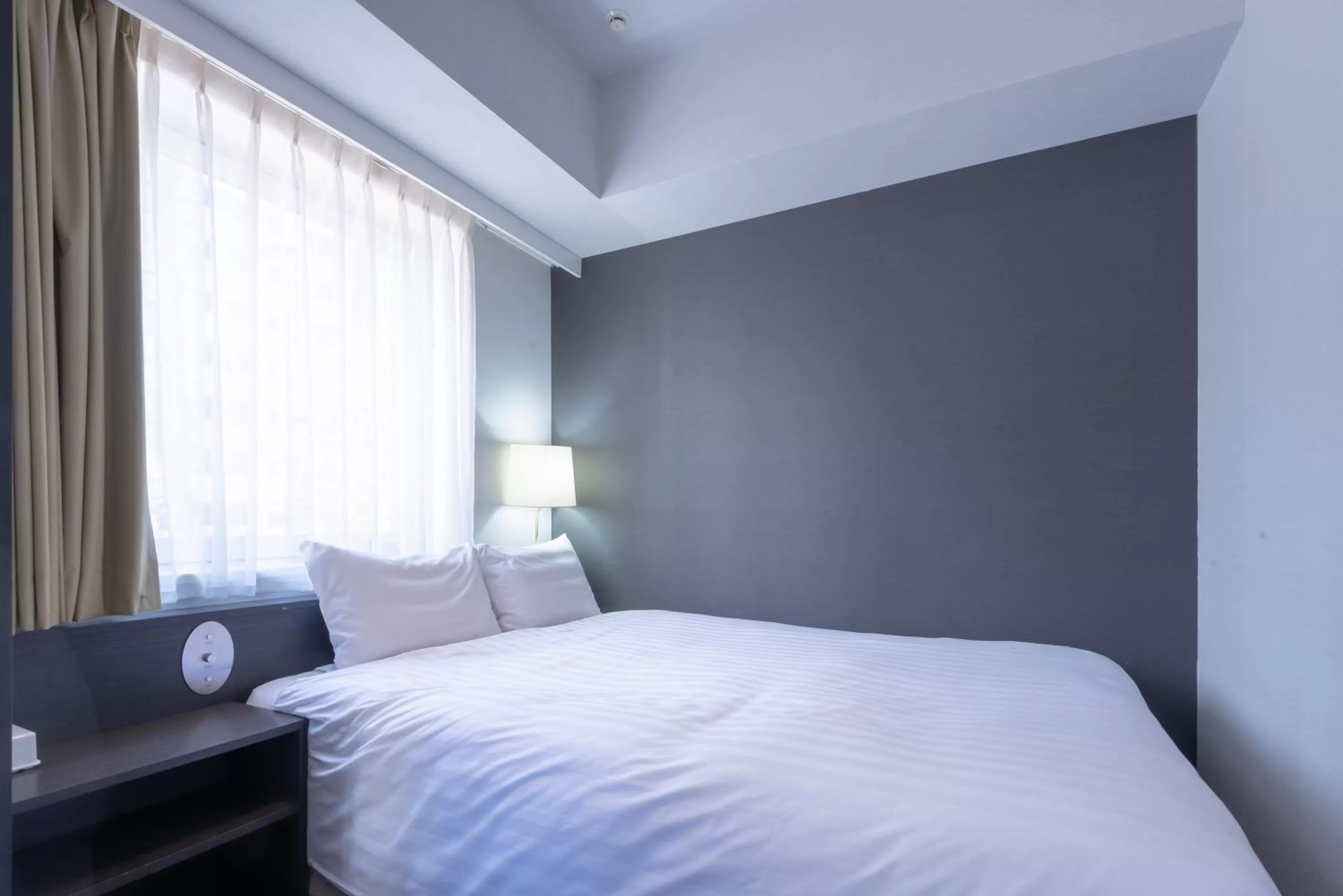 Bed in E Hotel Higashi Shinjuku