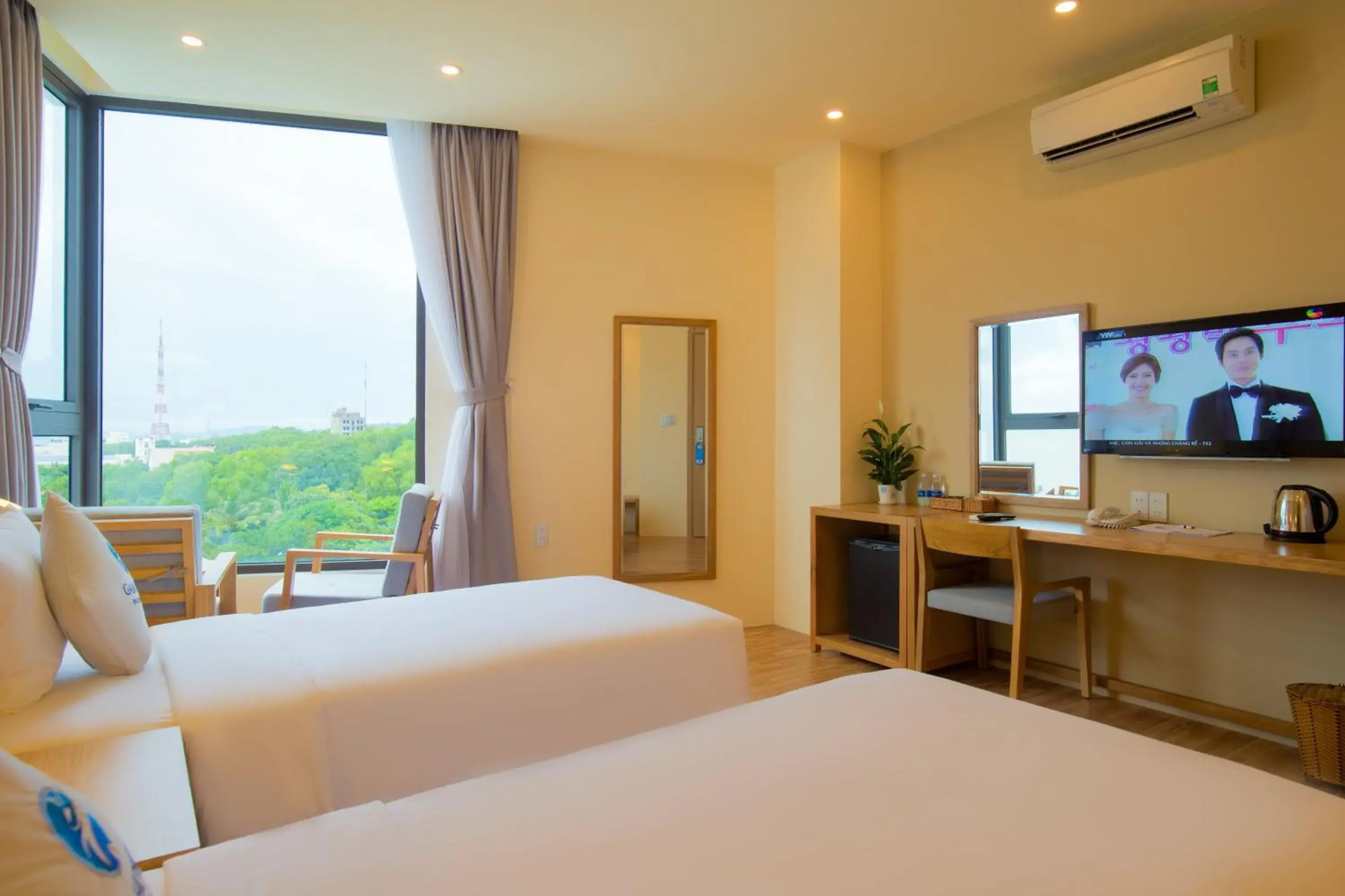 Bed, TV/Entertainment Center in Gaia Hotel PhuQuoc