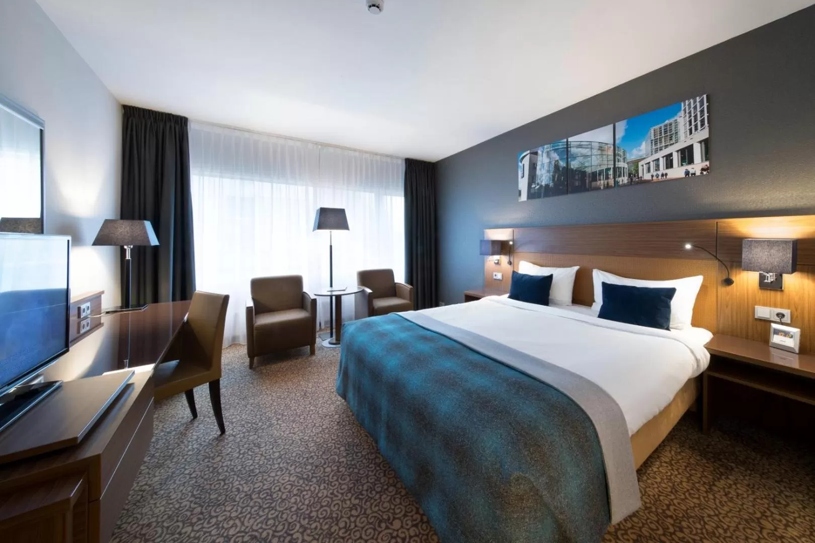 Photo of the whole room, Bed in Bilderberg Garden Hotel