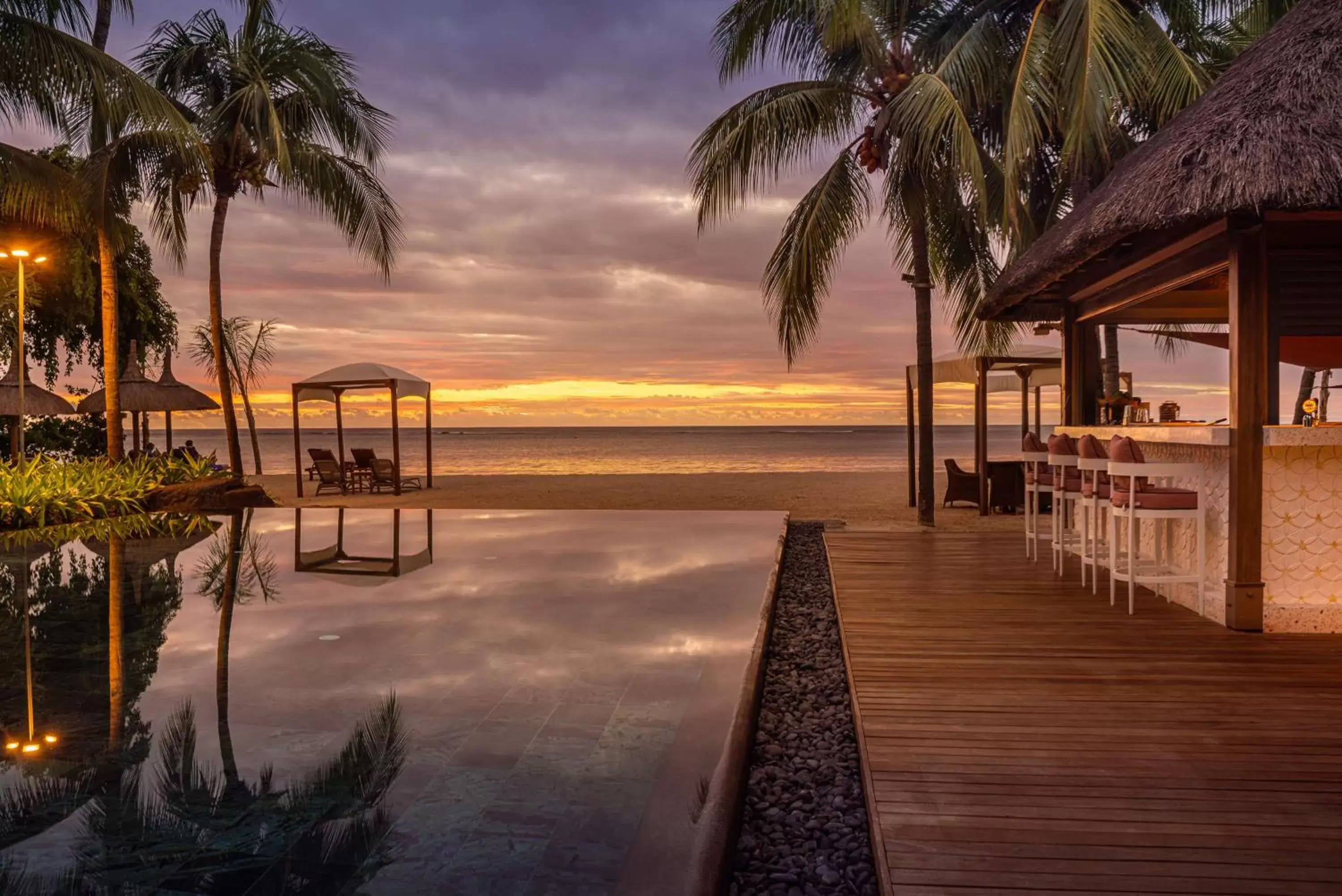 Lounge or bar, Swimming Pool in Hilton Mauritius Resort & Spa