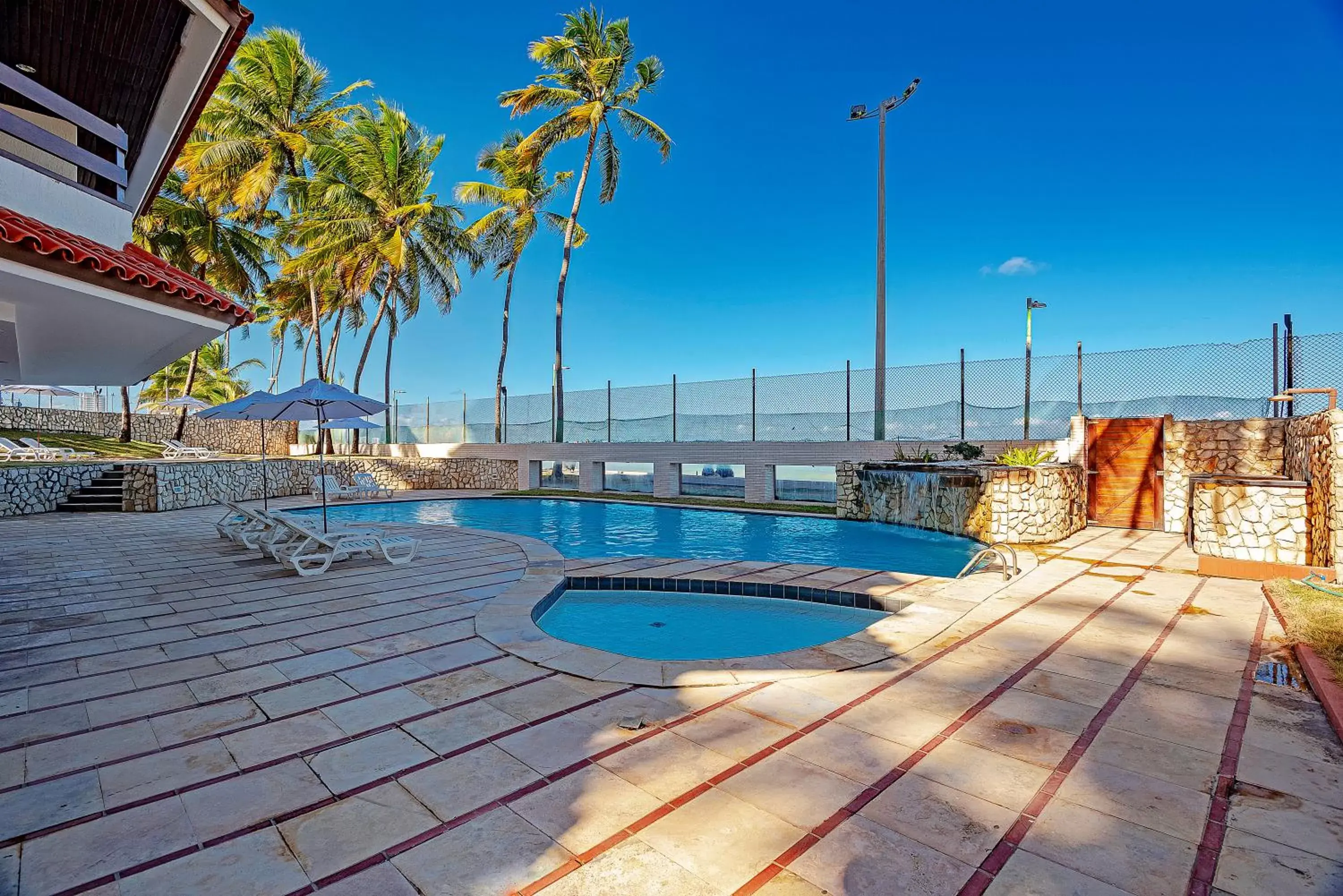 Natural landscape, Swimming Pool in Jatiúca Suites Resort by Slaviero Hotéis