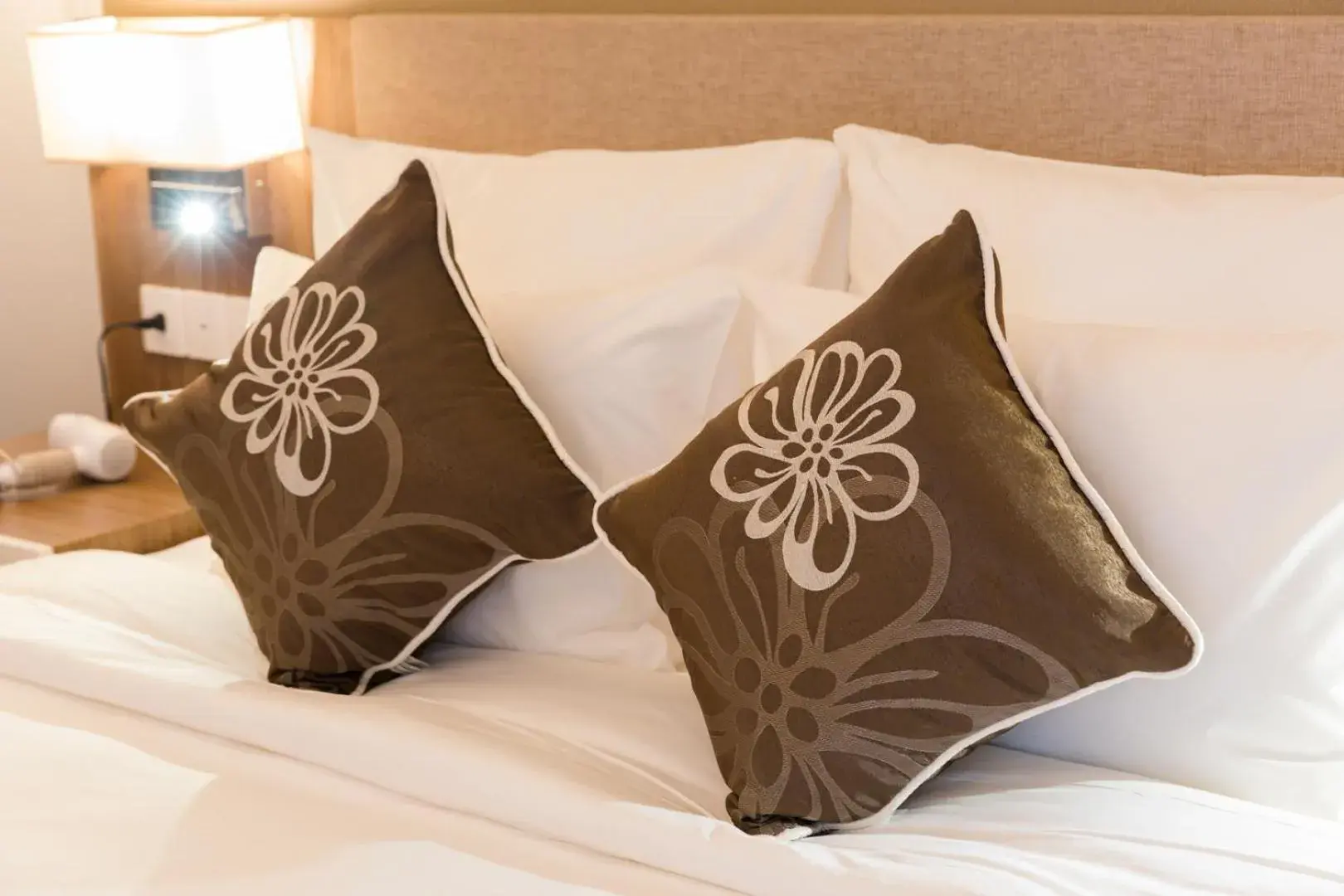 Bed in Asteria Comodo Nha Trang Hotel