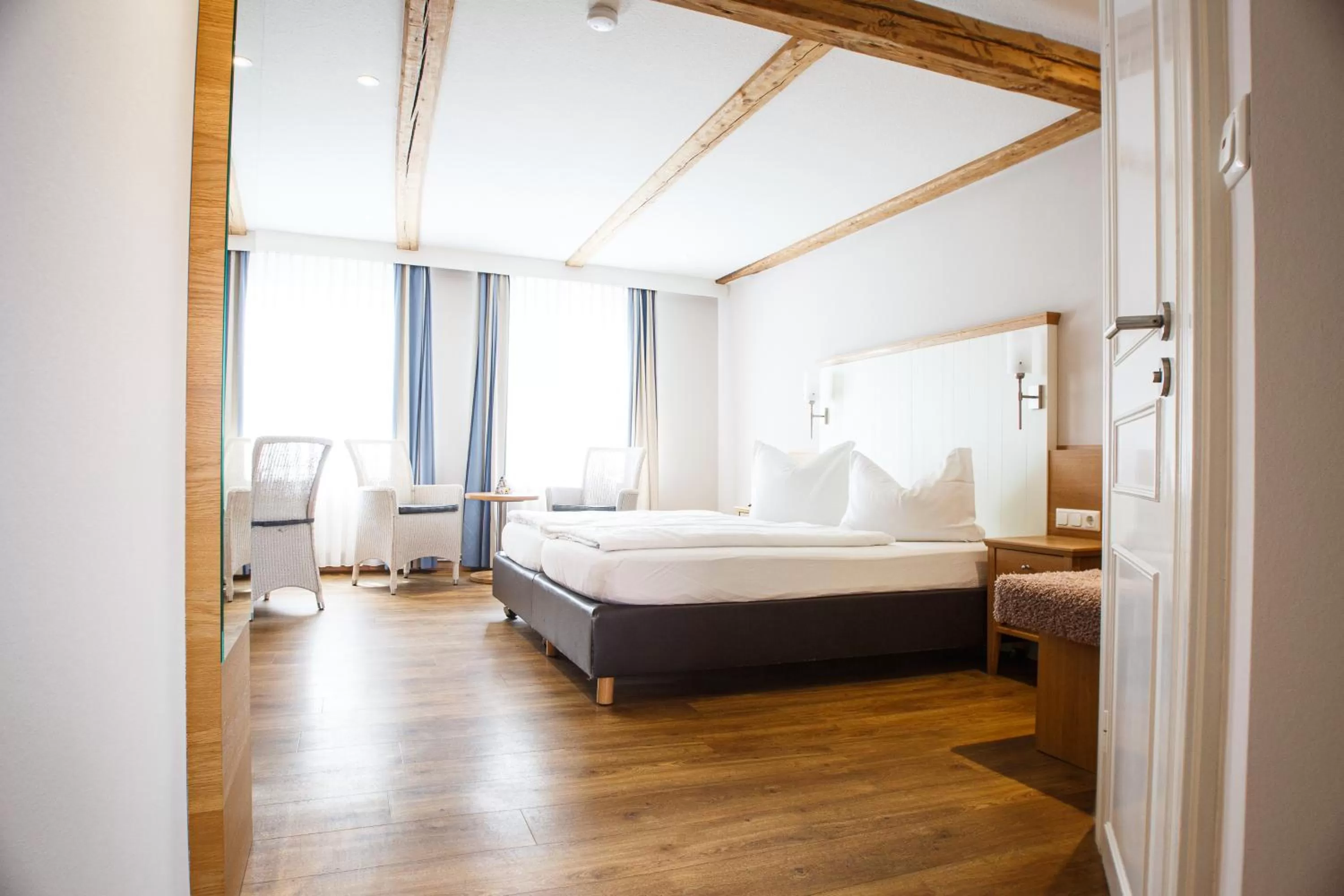 Bed in Romantik Hotel Aquarium