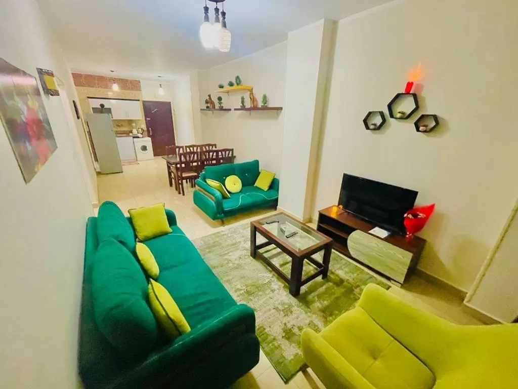 TV and multimedia, Seating Area in Charbel apartments