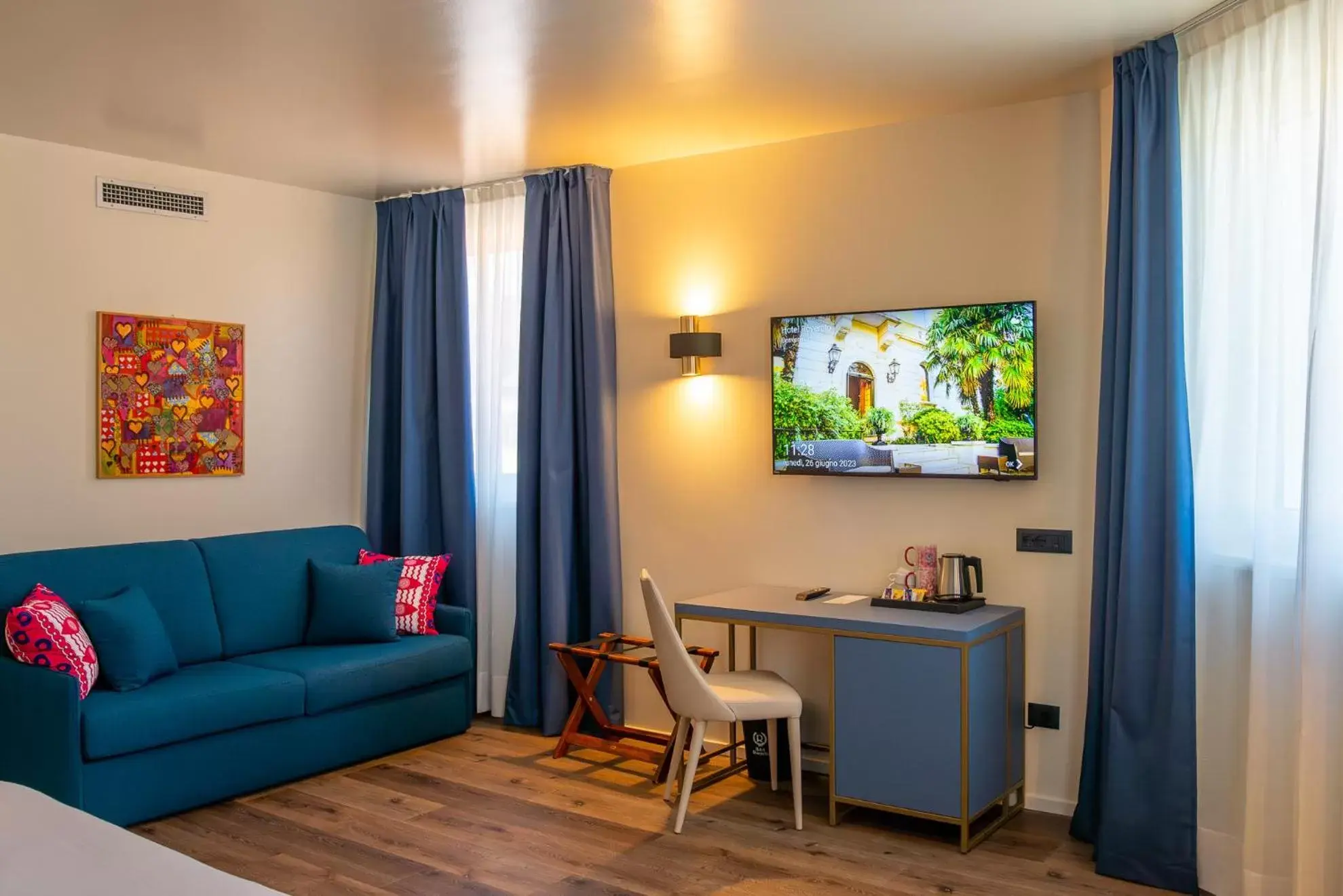 TV and multimedia, TV/Entertainment Center in Hotel Rovereto