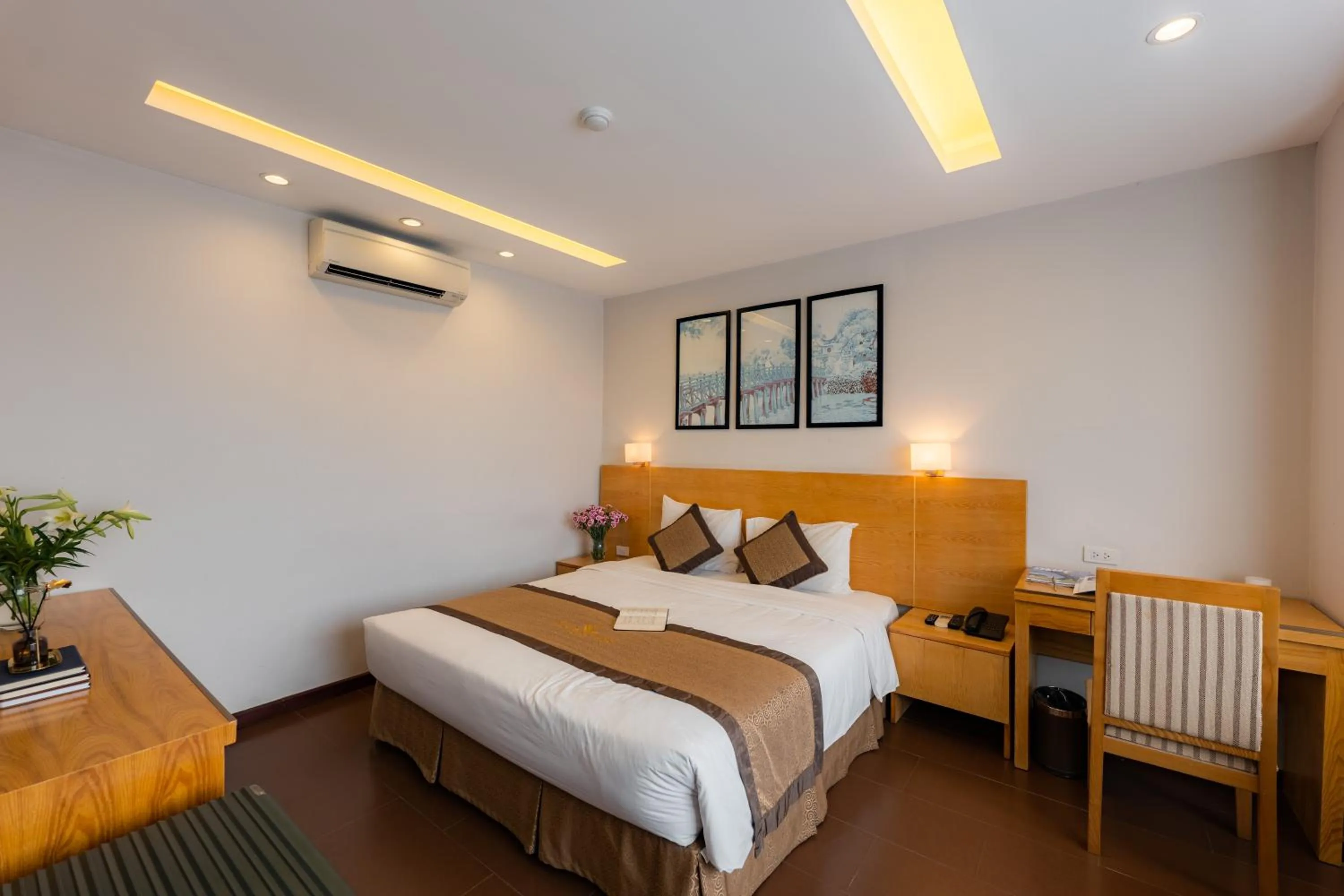 Bed in Riverside Hanoi Hotel