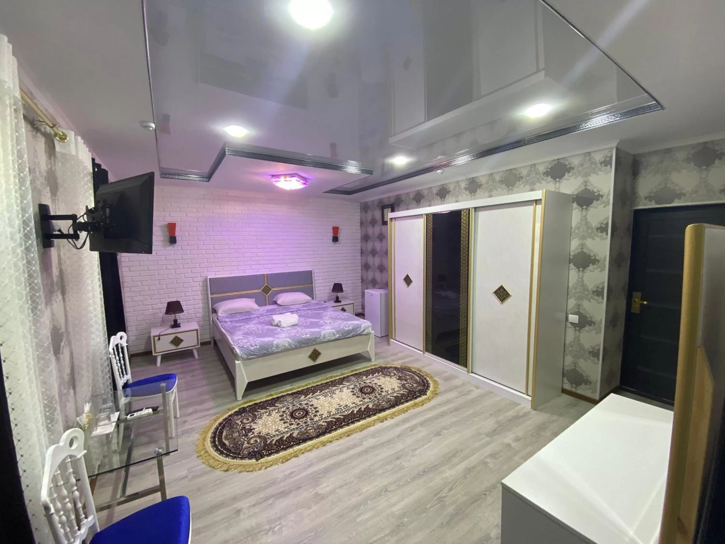 Bed in HOTEL UZBEGIM