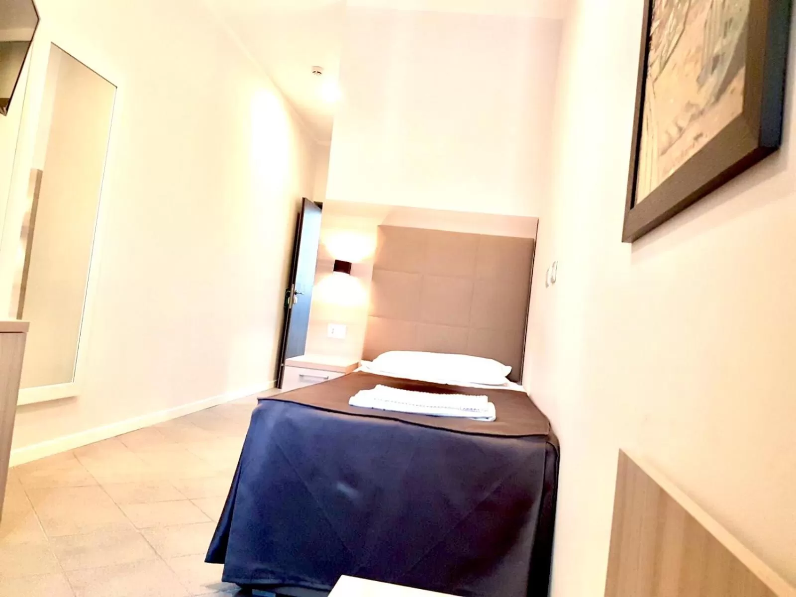 Bed in Academy Hotel