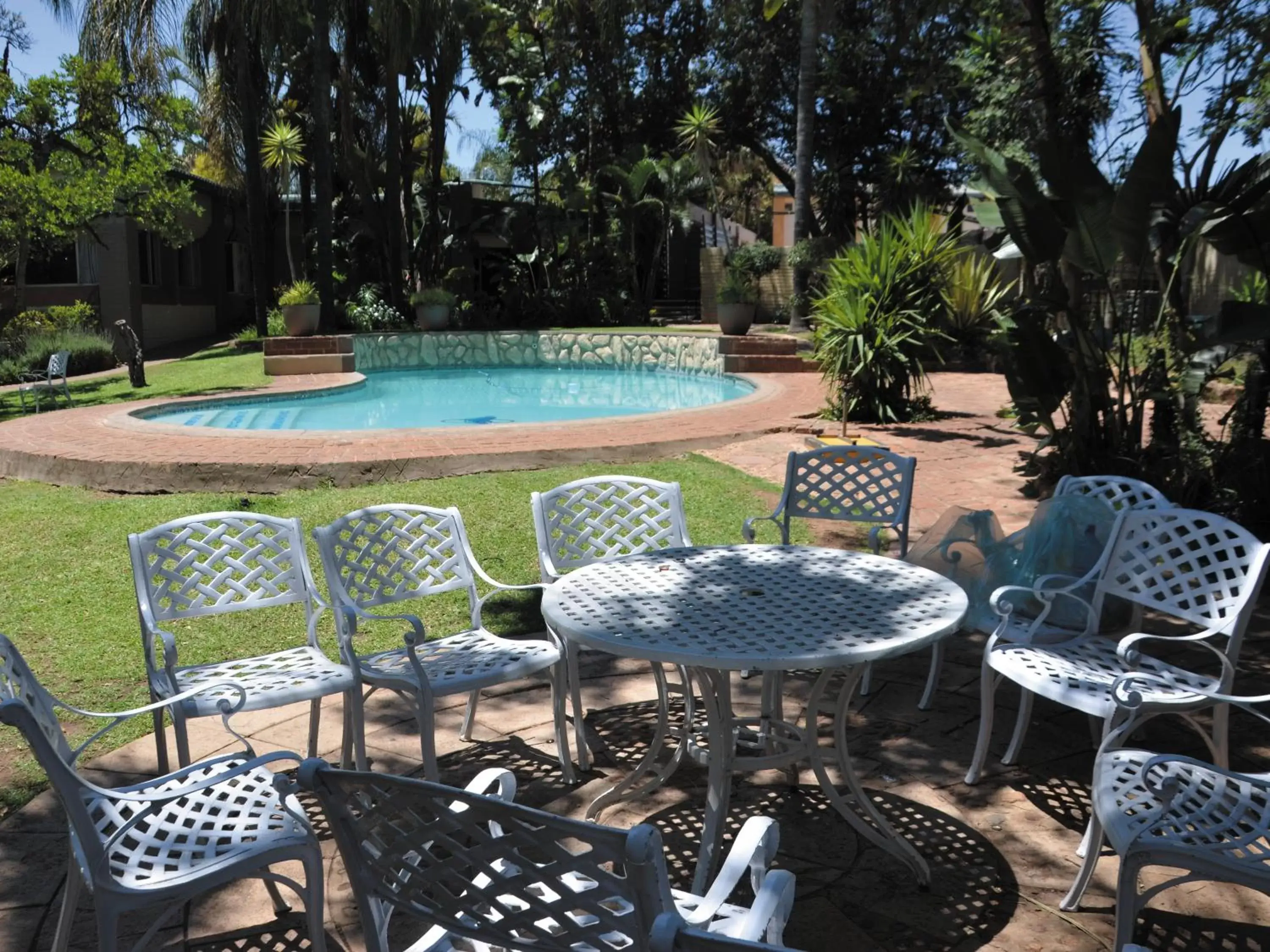 Patio, Swimming Pool in Safari Hotel & Convention Centre