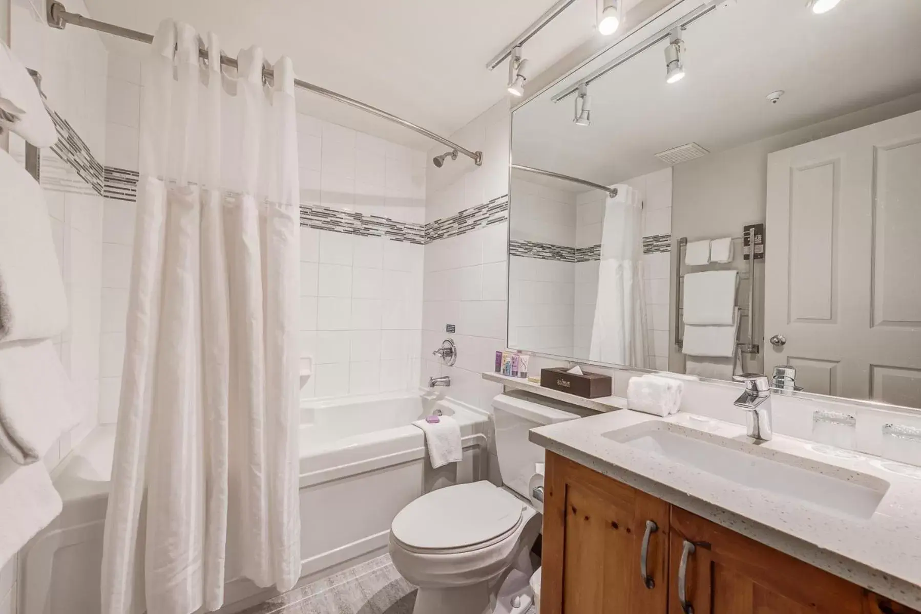 Shower, Bathroom in Blackcomb Springs Suites by CLIQUE