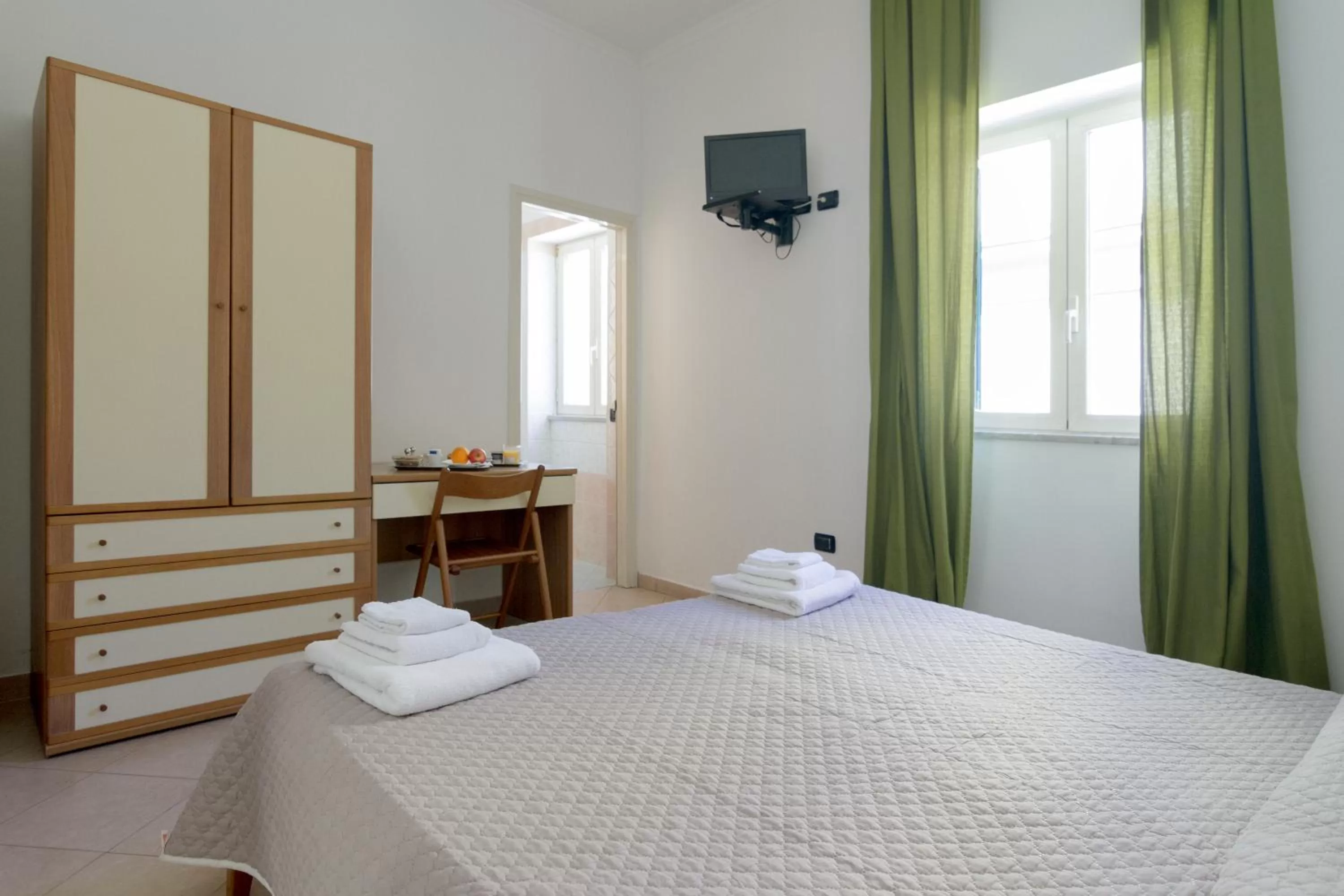 Bed in San Marco Hotel