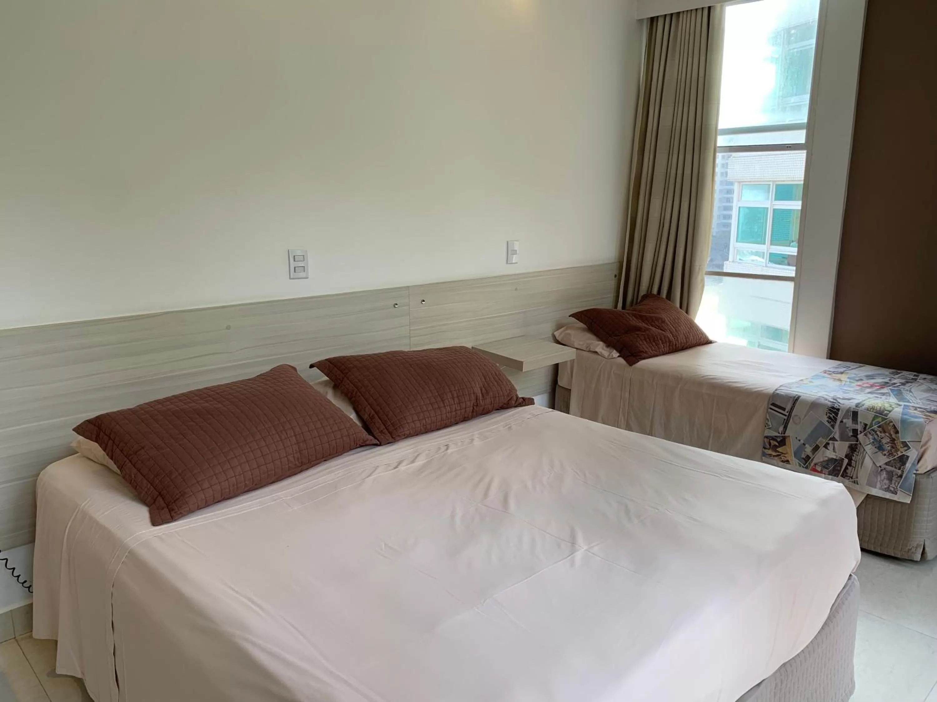 Bed in Grand Hotel Guarujá - A sua Melhor Experiência Beira Mar na Praia!