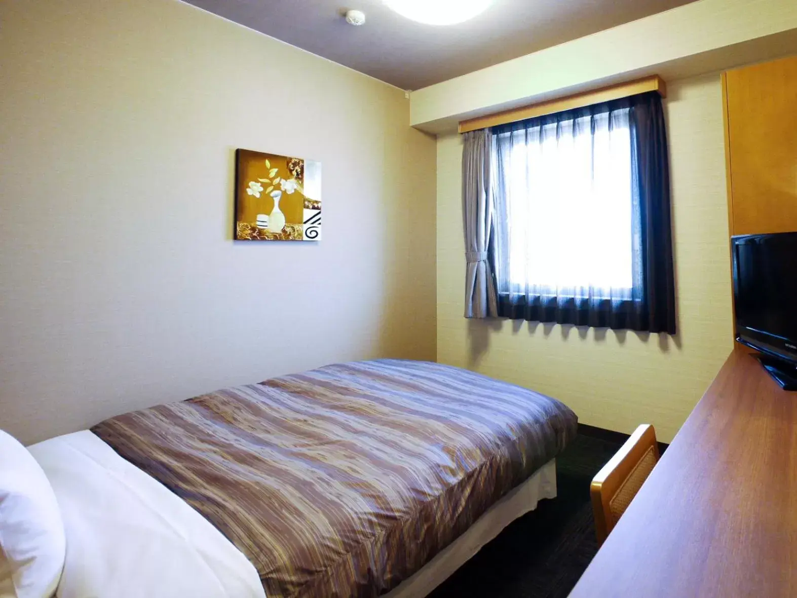 Bed in Hotel Route-Inn Tajimi Inter