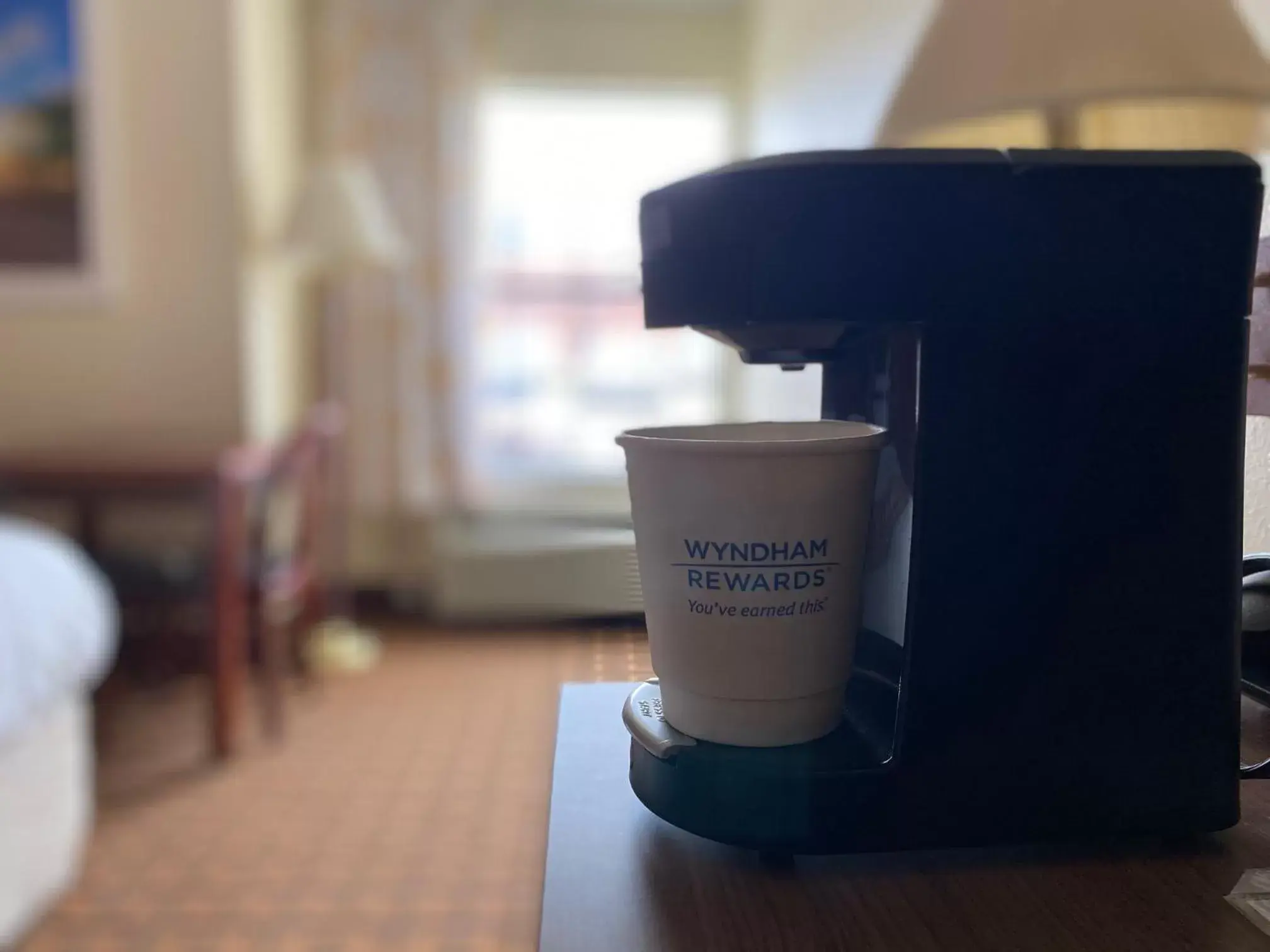 Coffee/tea facilities in Days Inn by Wyndham Dallas Plano