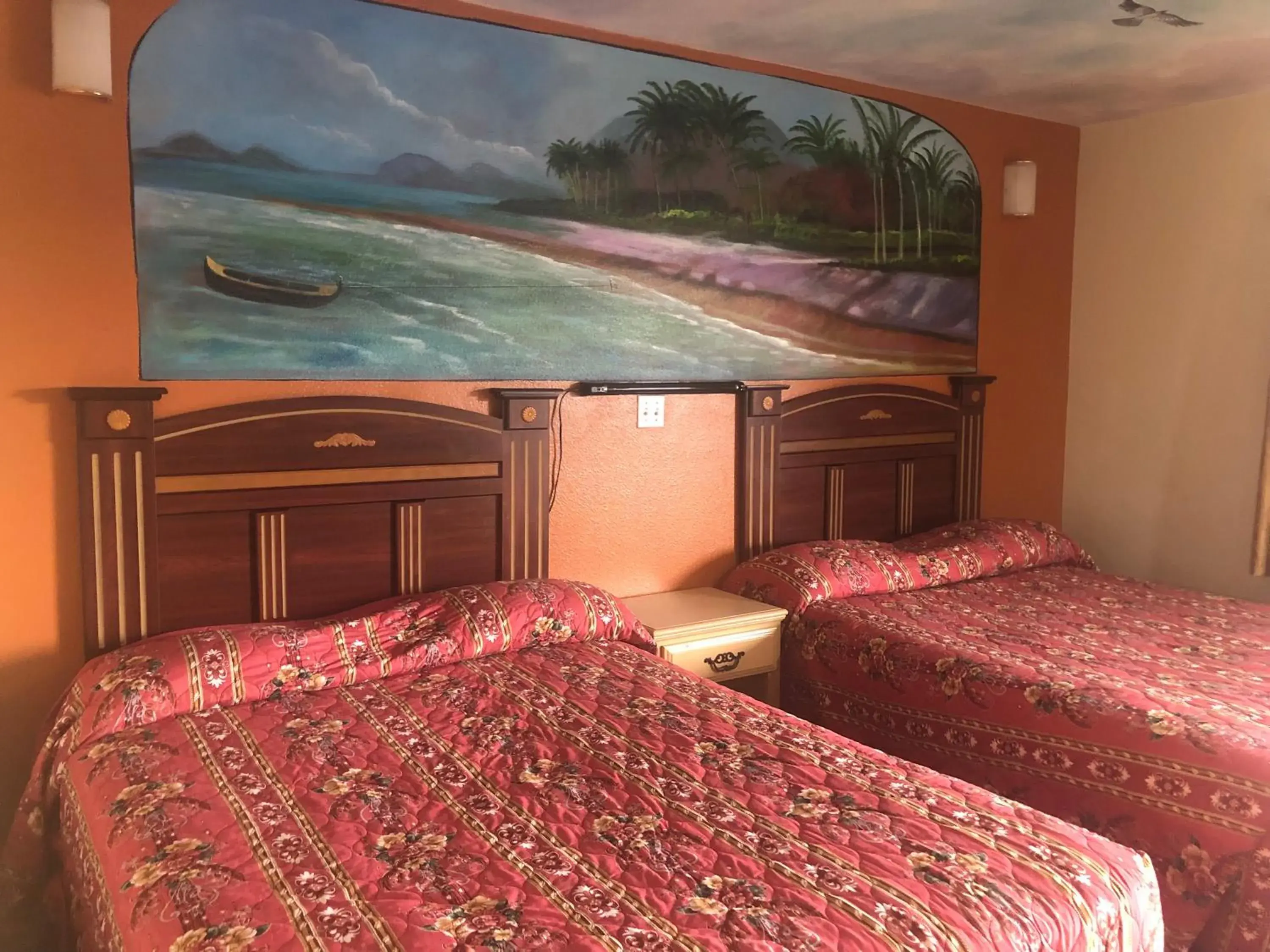 Bed in Robinhood Motel