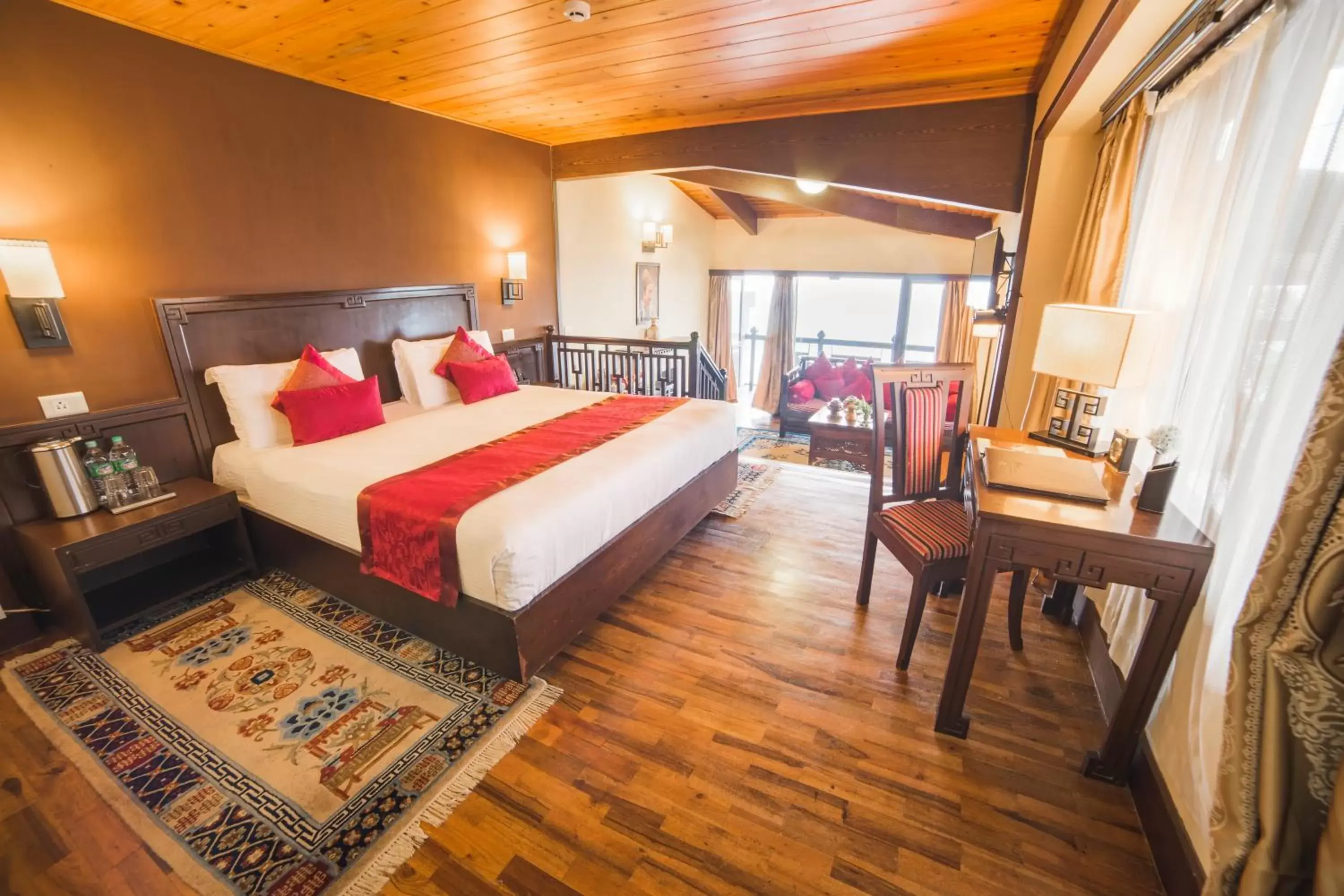 Living room, Bed in Denzong Regency- Luxury Mountain Retreat Spa & Casino