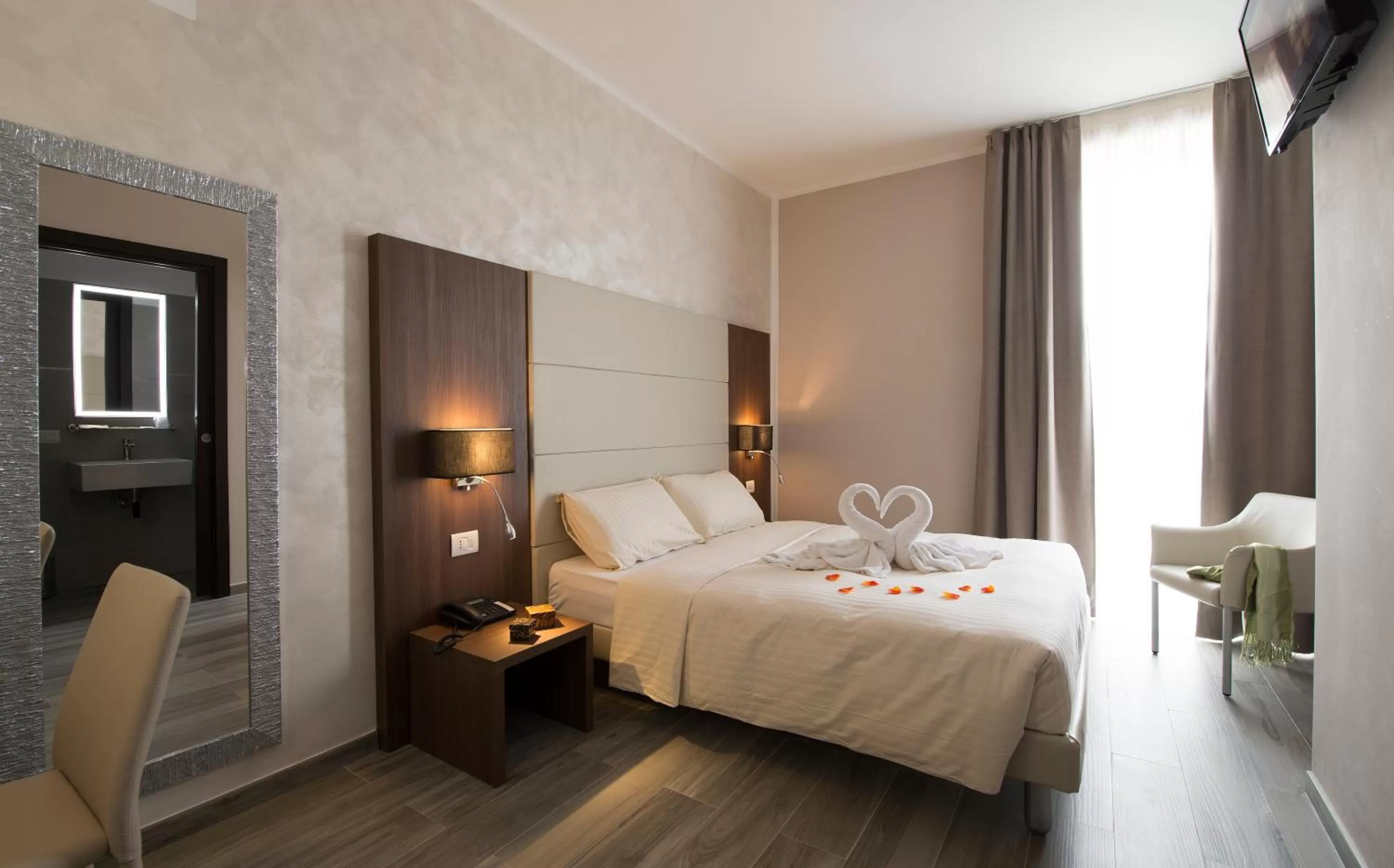 Bed in Oasi Village Hotel