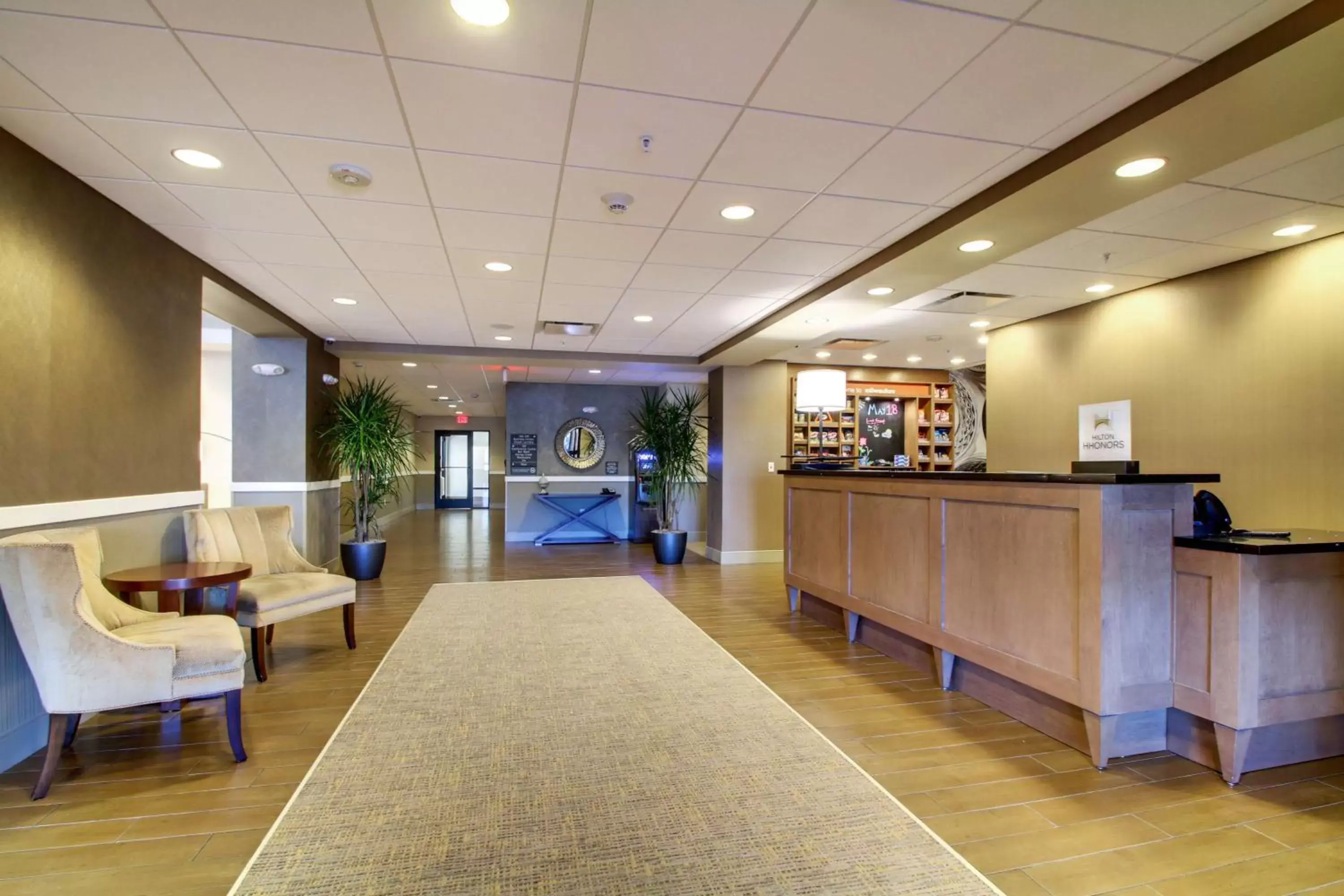 Lobby or reception in Hampton Inn & Suites Milwaukee West Lobby or reception in Hampton Inn & Suites Milwaukee West