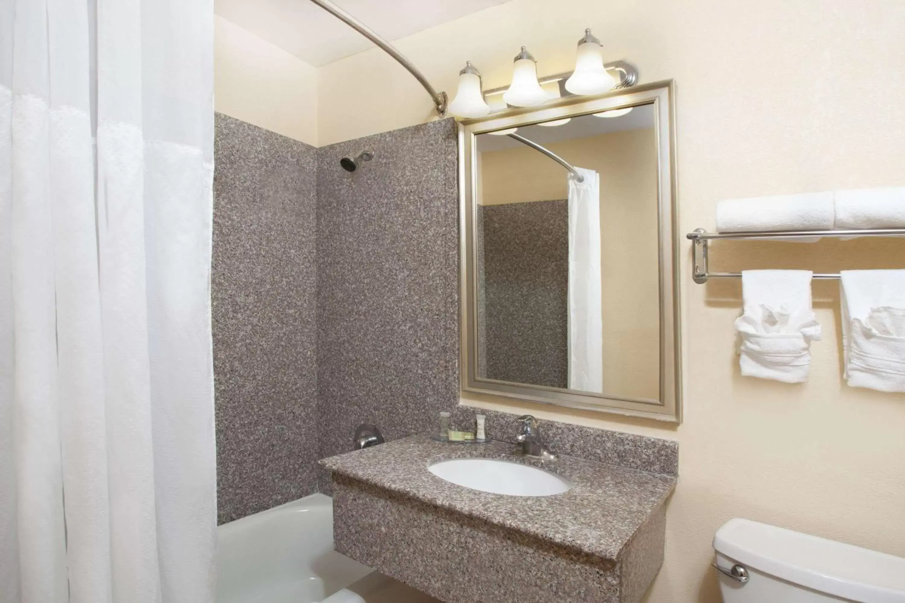 Photo of the whole room, Bathroom in Super 8 by Wyndham Chicago Northlake O'Hare South