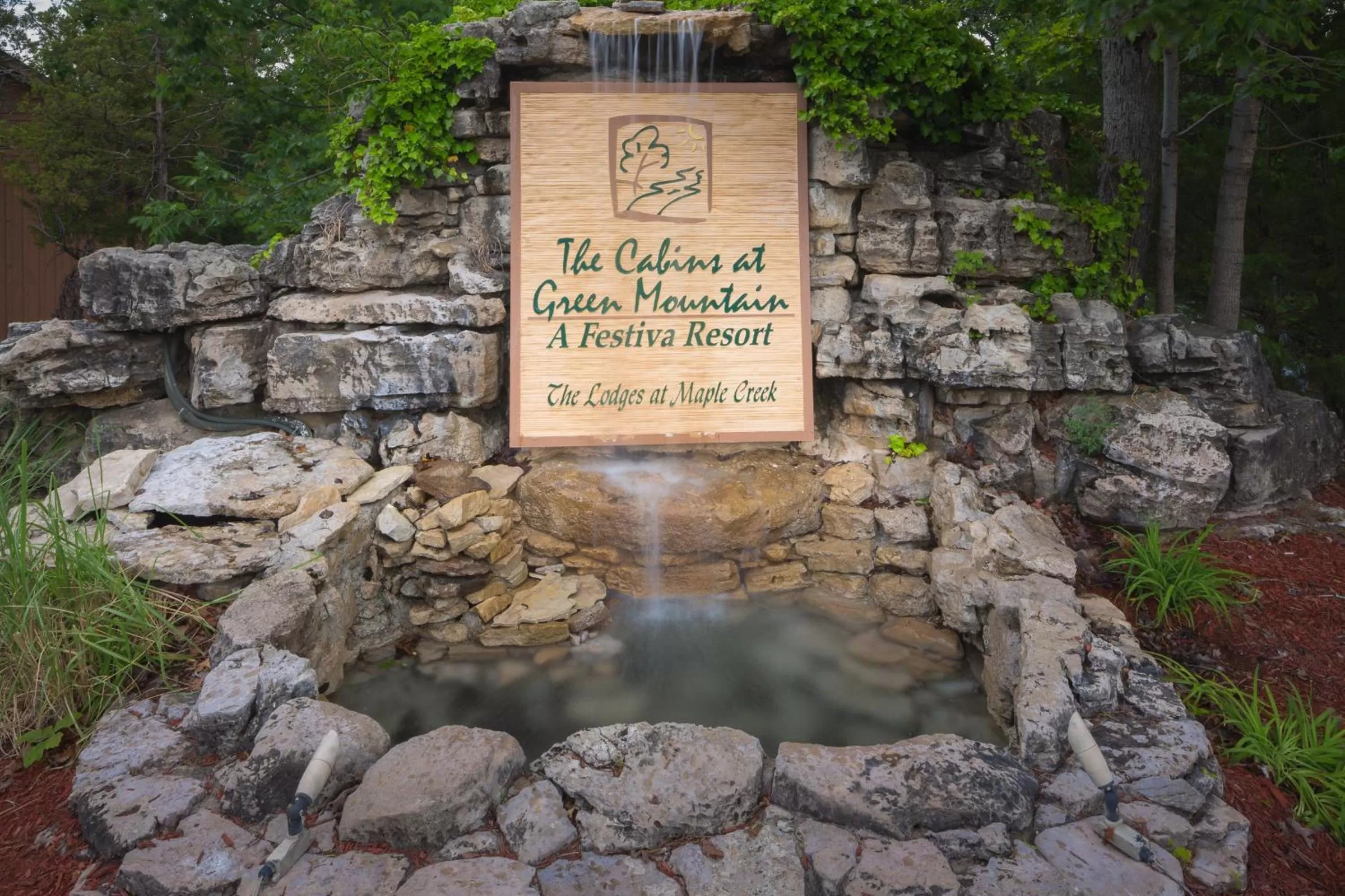 Property logo or sign in Cabins at Green Mountain, Trademark Collection by Wyndham