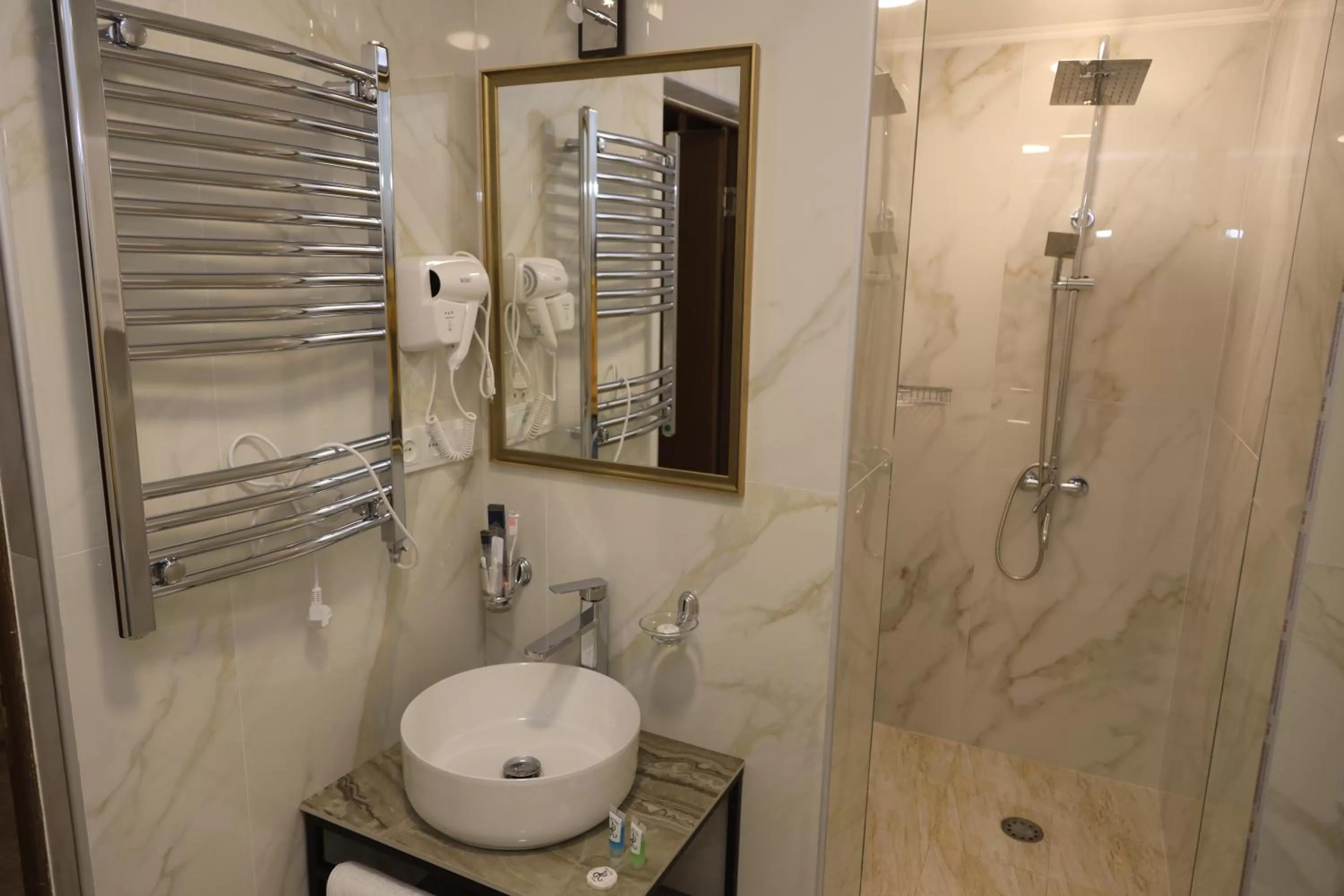 Shower in DeLin Hotel And Tours