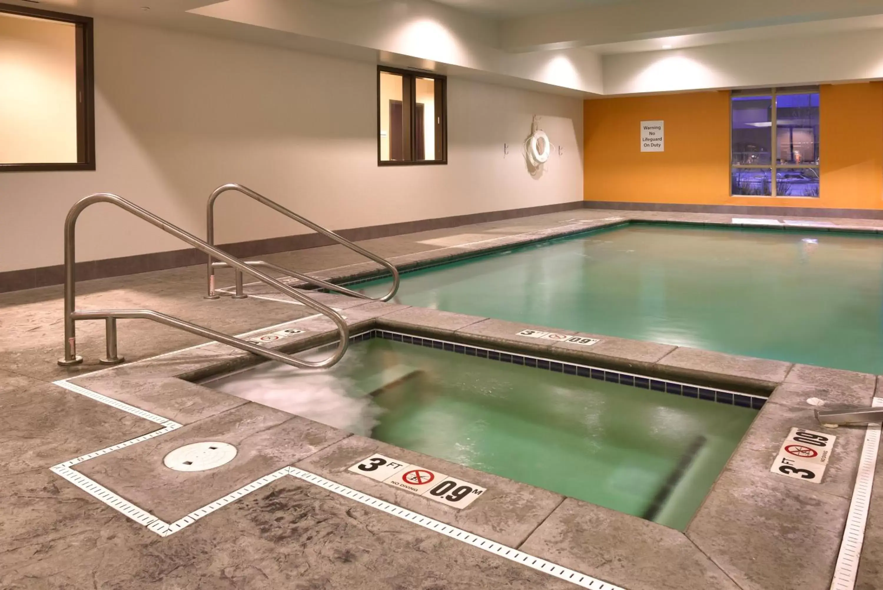 Swimming Pool in Holiday Inn Express & Suites Overland Park, an IHG Hotel