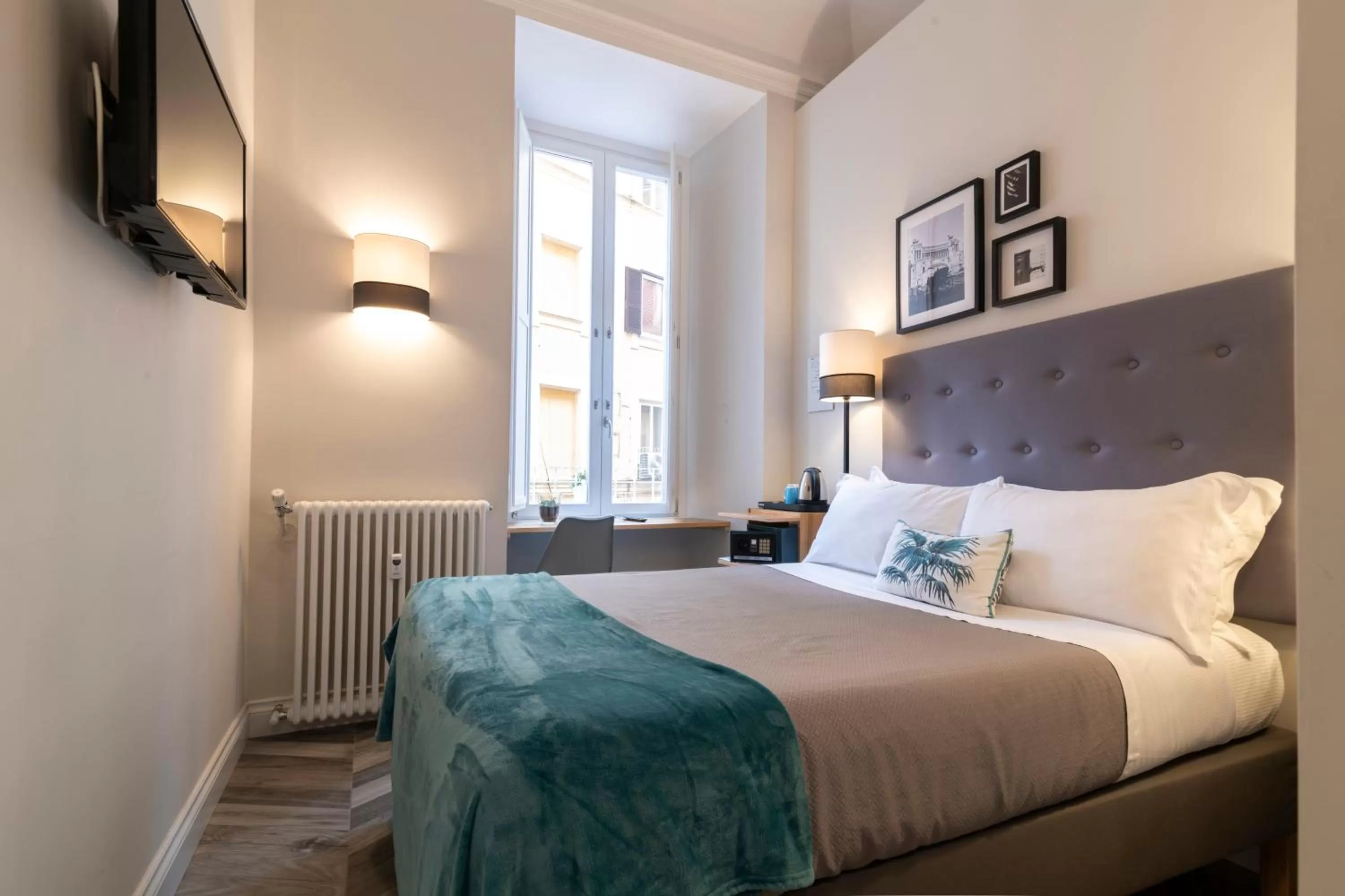 Bed in Eccelso Hotel