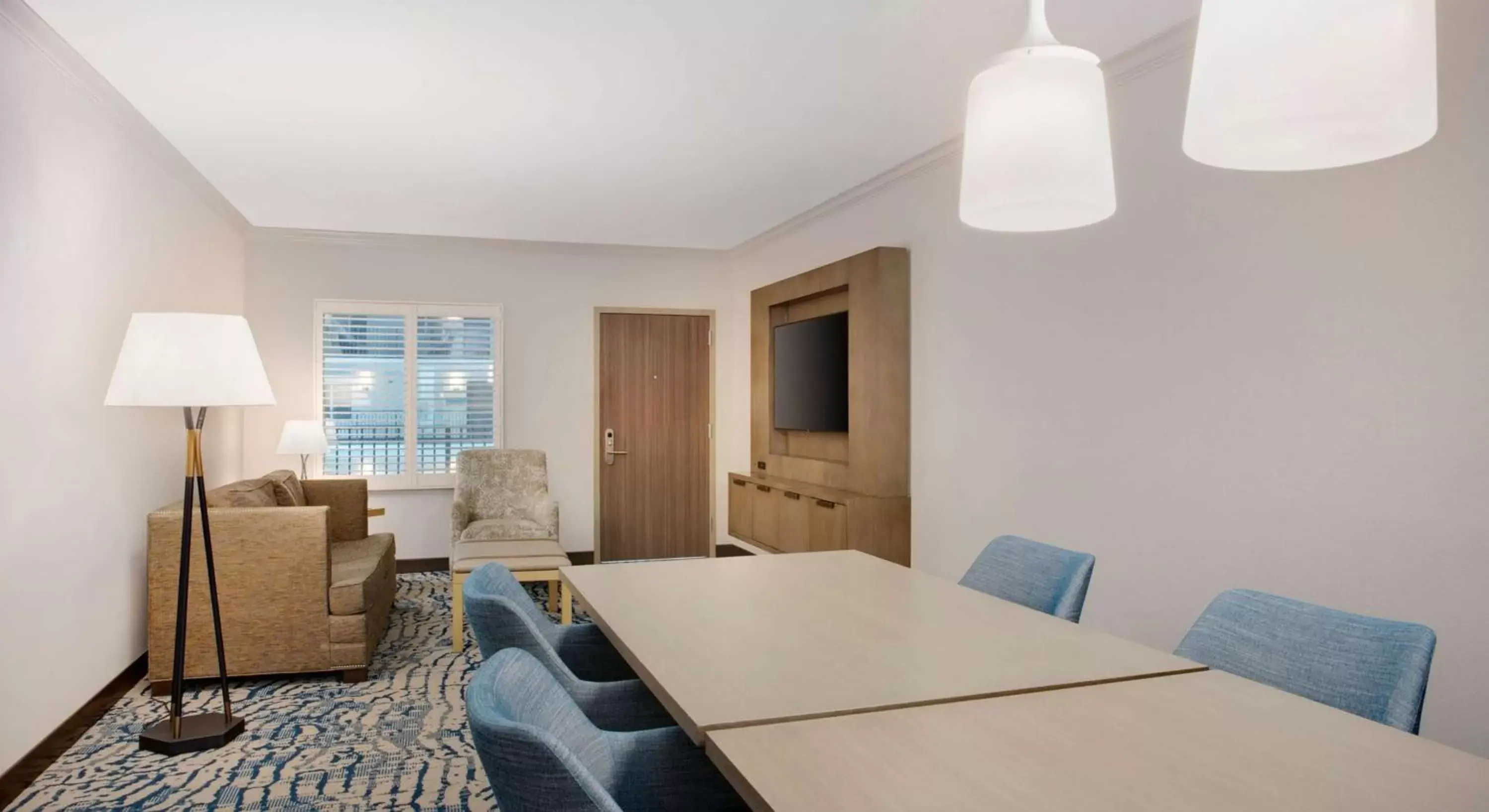 Bedroom, Dining Area in Embassy Suites by Hilton Tampa Downtown Convention Center